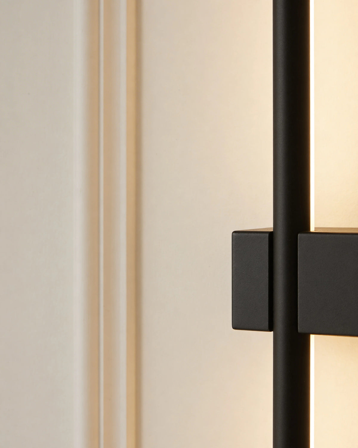 Vera black tube wall light, close-up detail