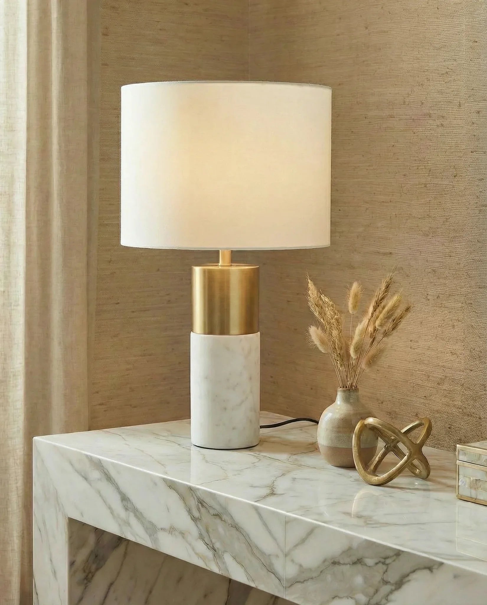 Victoria white marble table lamp with fabric shade in a Dubai bedroom