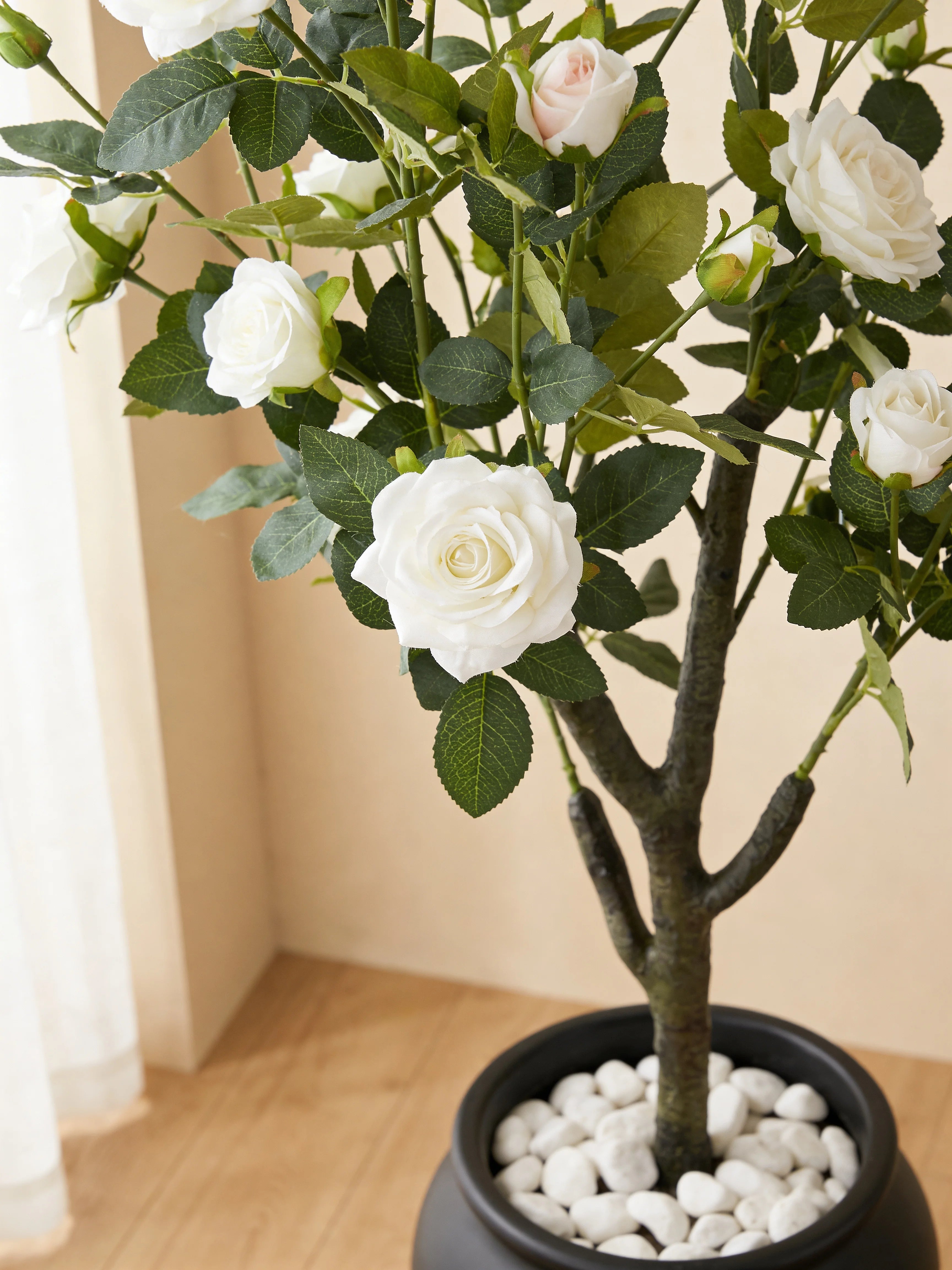 White rose artificial flowers in a Dubai living room