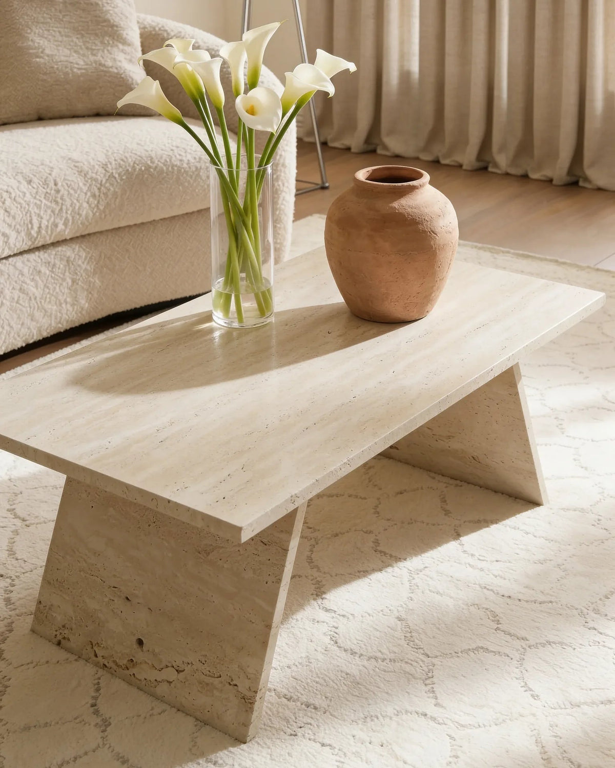 Winston travertine coffee table, close-up of the warm beige stone