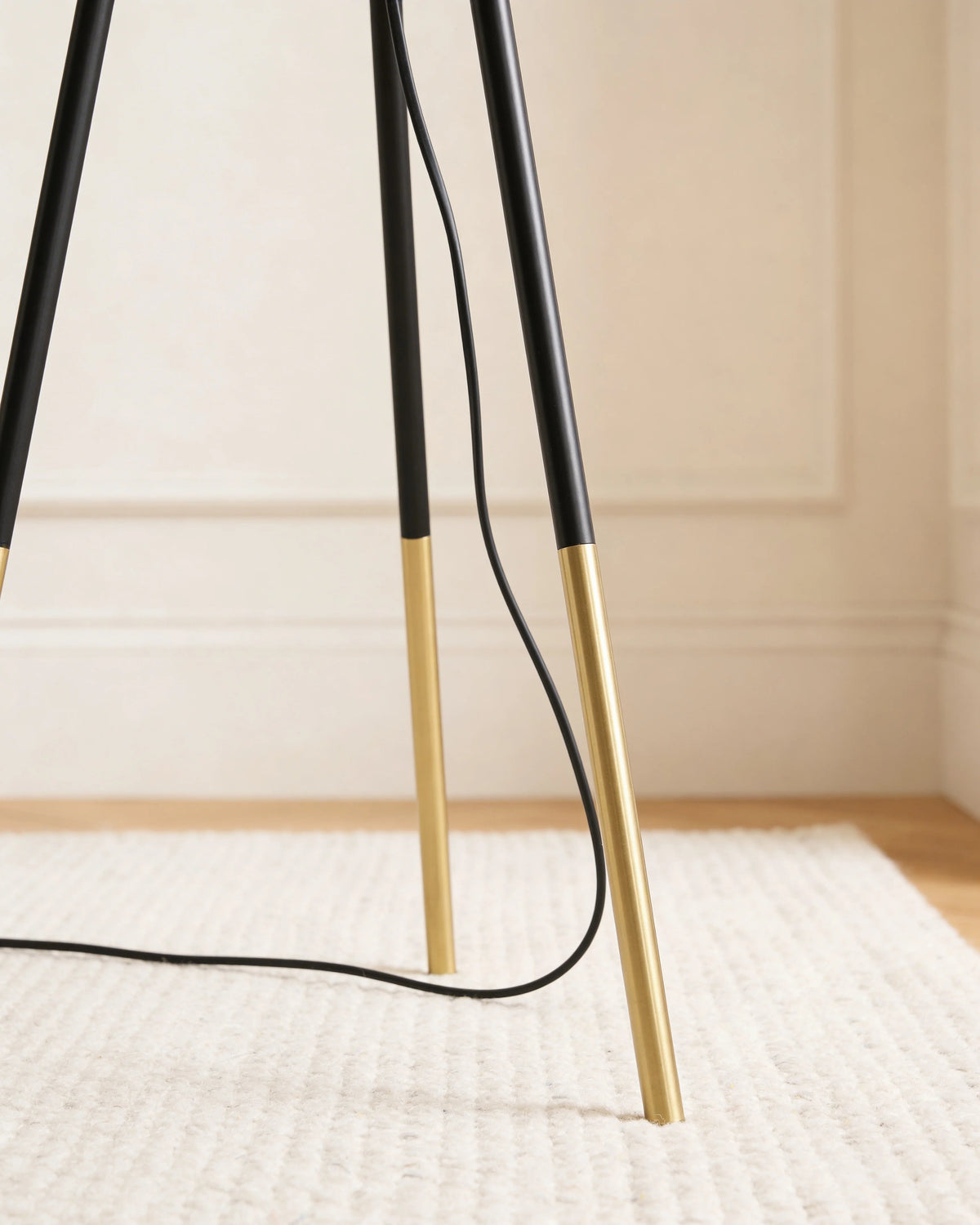 Zoha black and gold tripod floor lamp, close-up detail