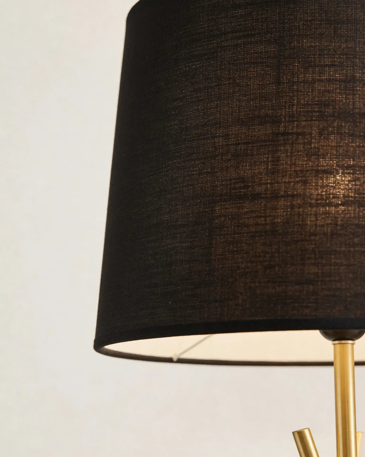 Tripod floor lamp in a Dubai living room