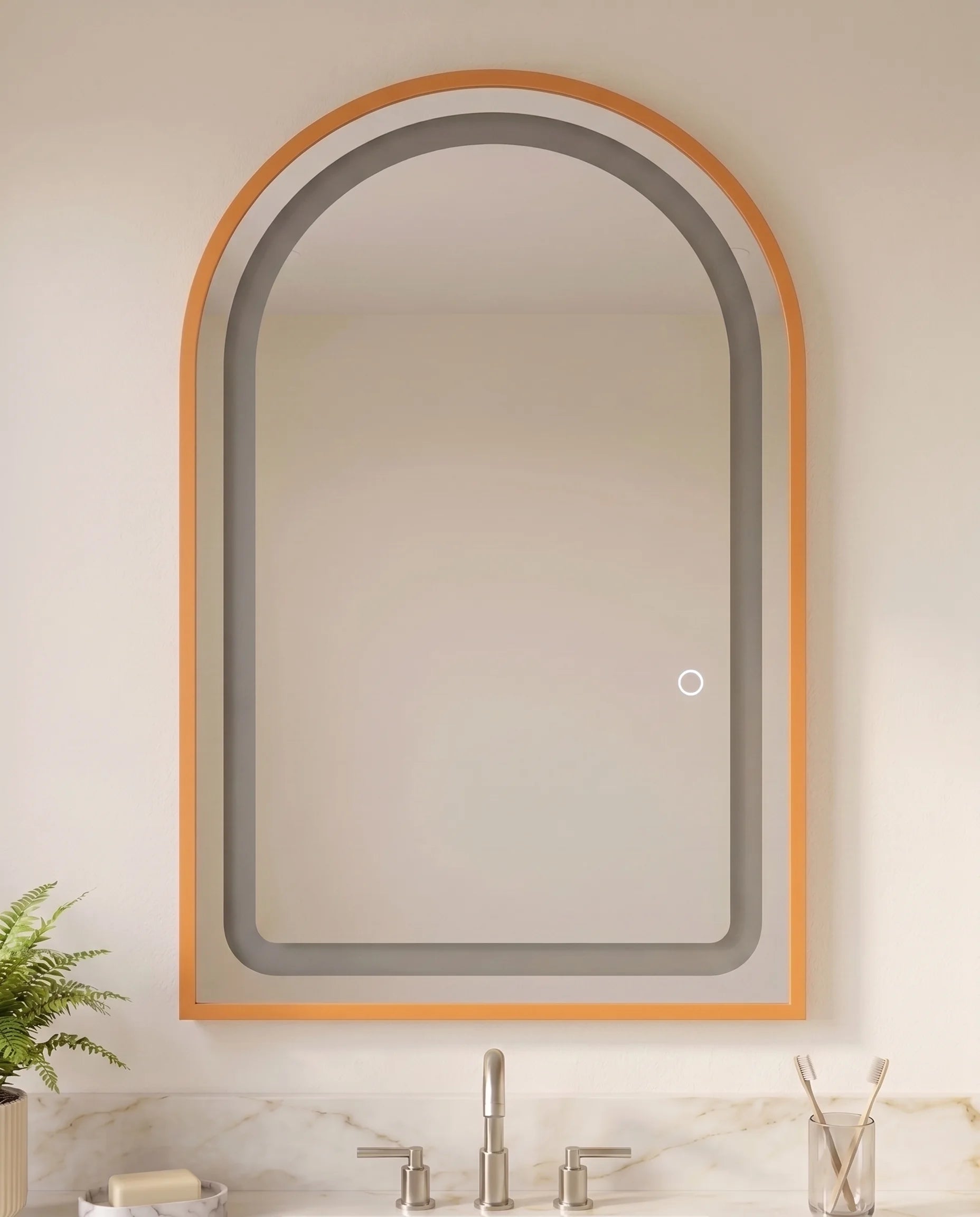 Bambi gold framed arched LED mirror in a Dubai bathroom