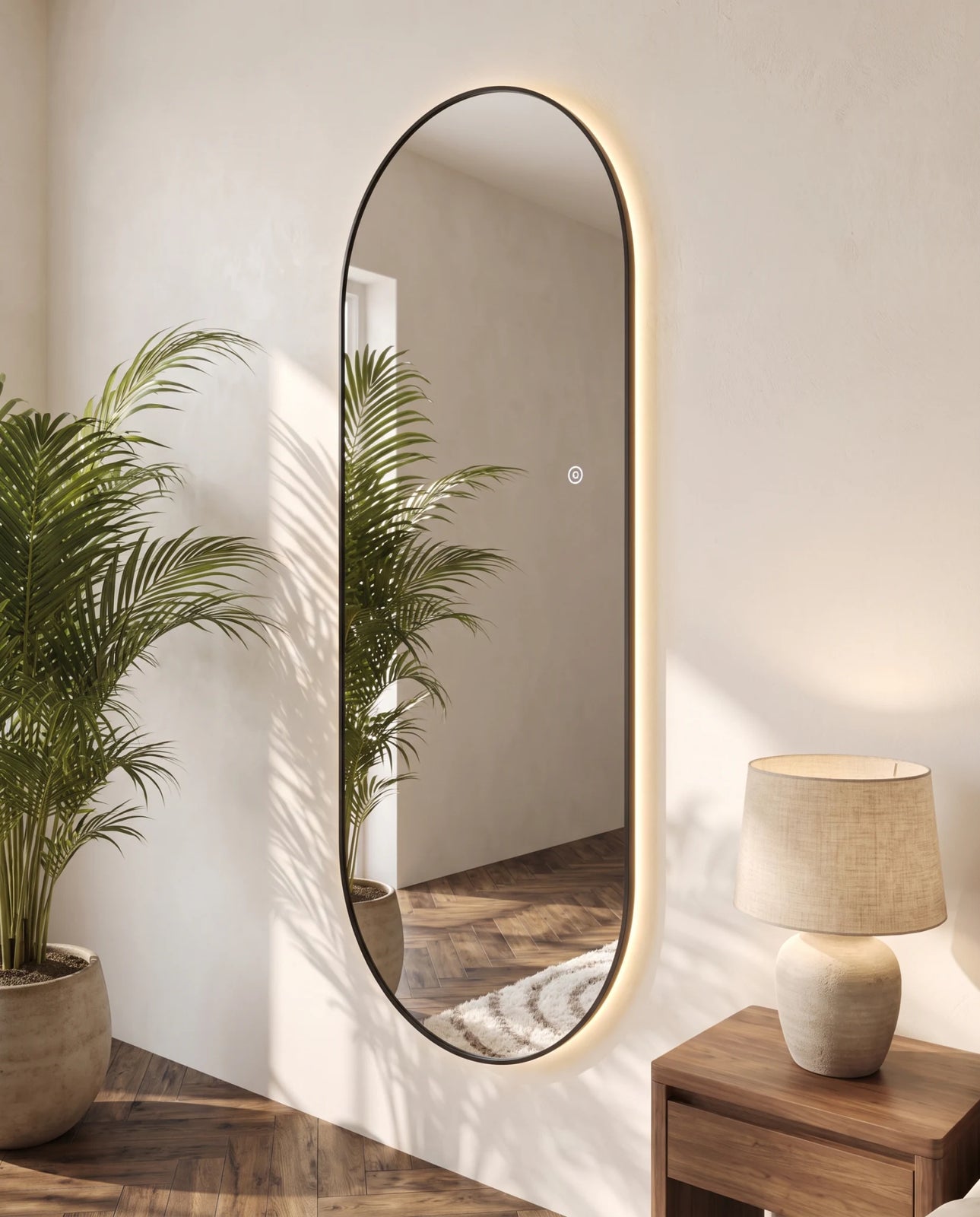 Elara black backlit oval wall mirror, full view