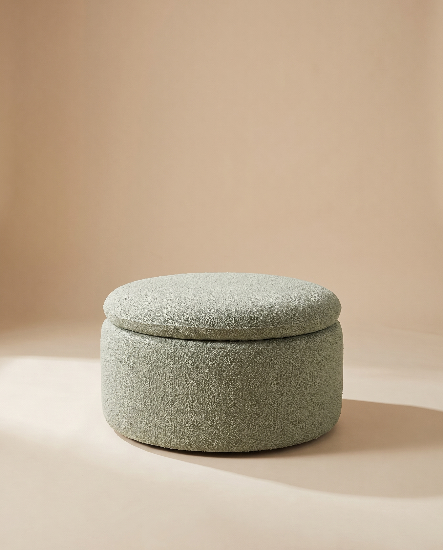 Romy sage bouclé storage pouf
