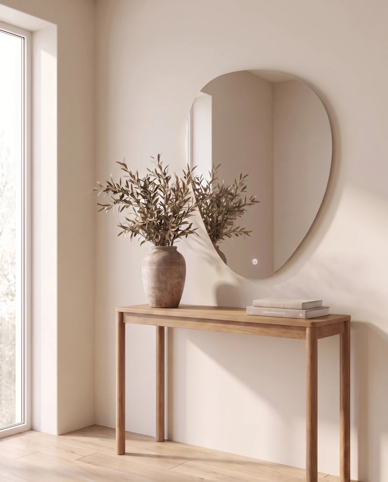 Isla frameless irregular LED mirror, close-up of the lit edge