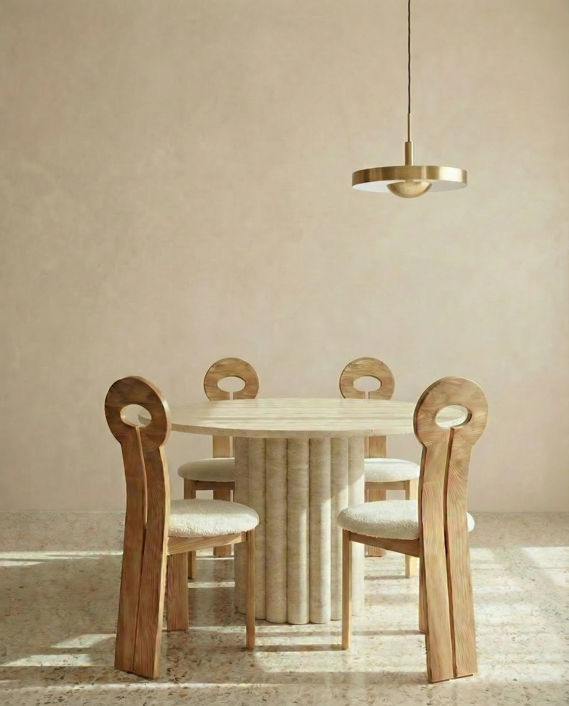 Round travertine dining table, close-up of the fluted base