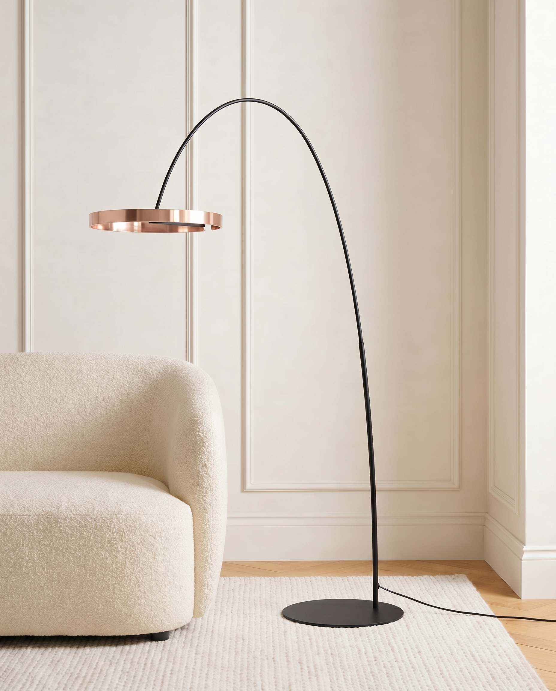 Arched black and gold floor lamp with ring