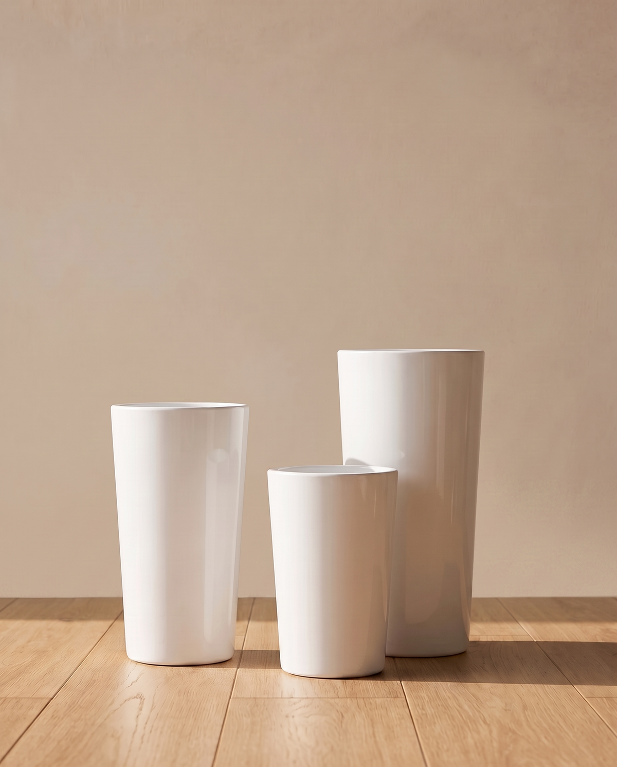 White Fiber Glass Planter – three tall tapered sizes together