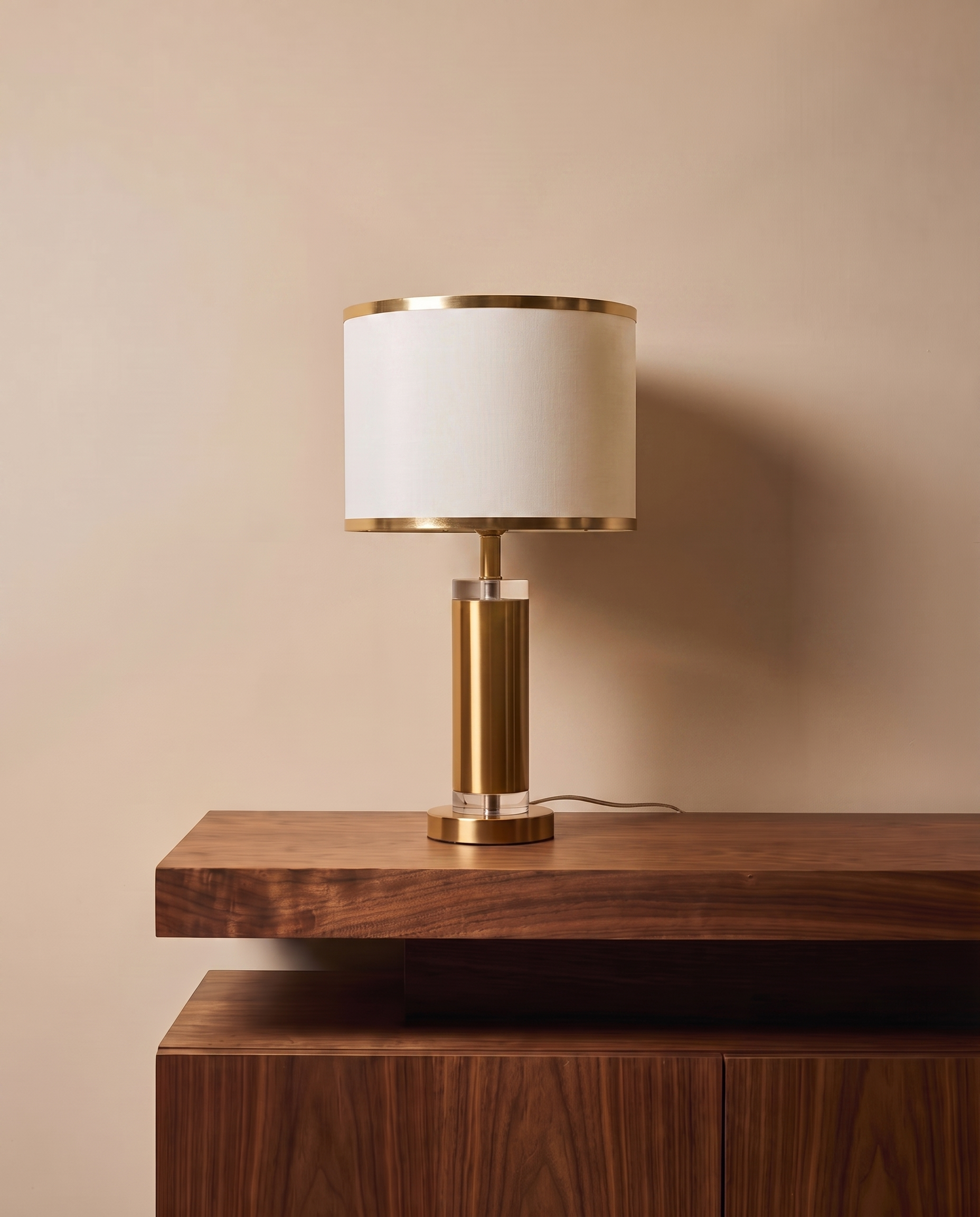 Gold table lamp with off-white shade