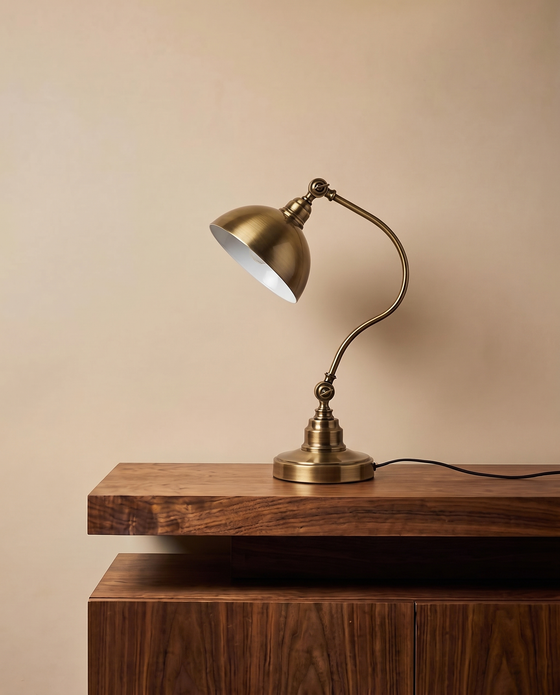 Adjustable gold table lamp