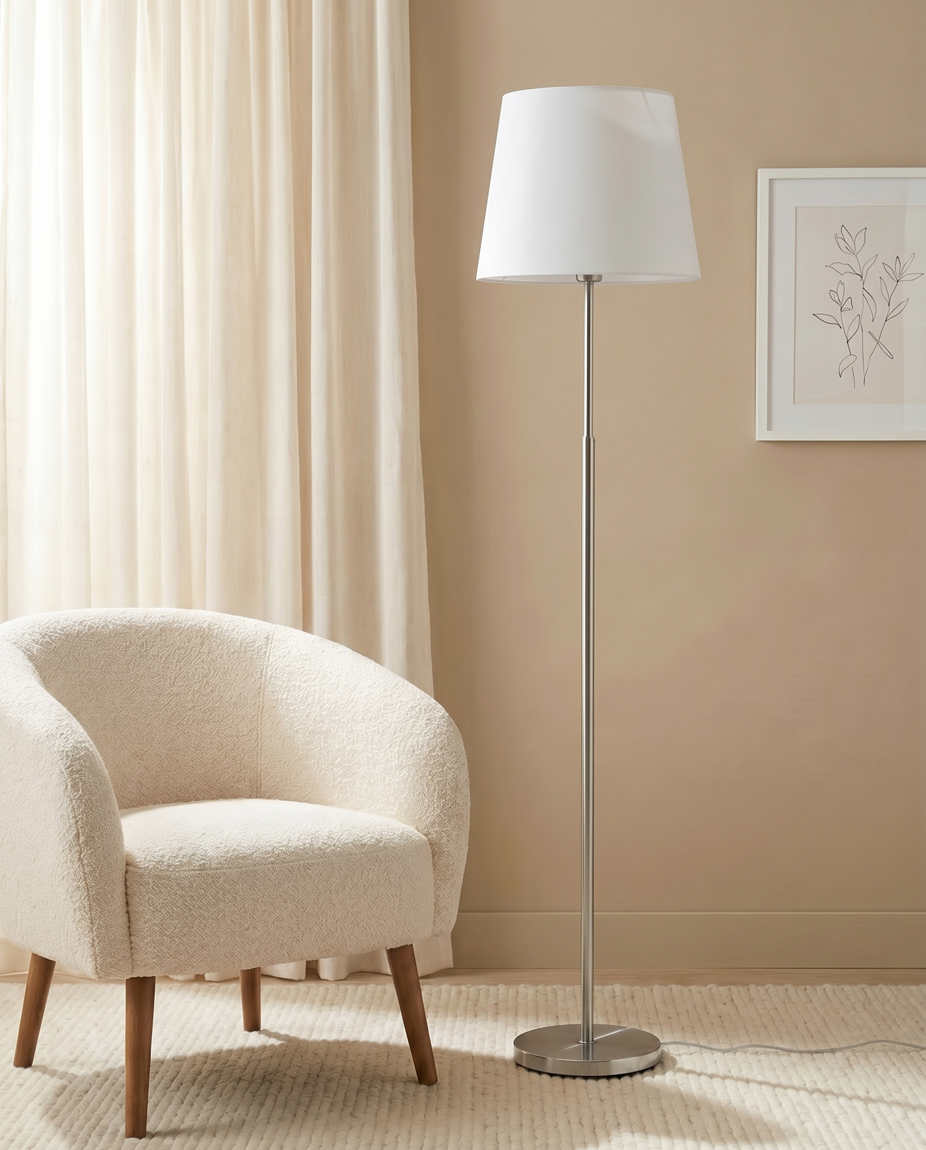 Silver floor lamp with off-white fabric shade