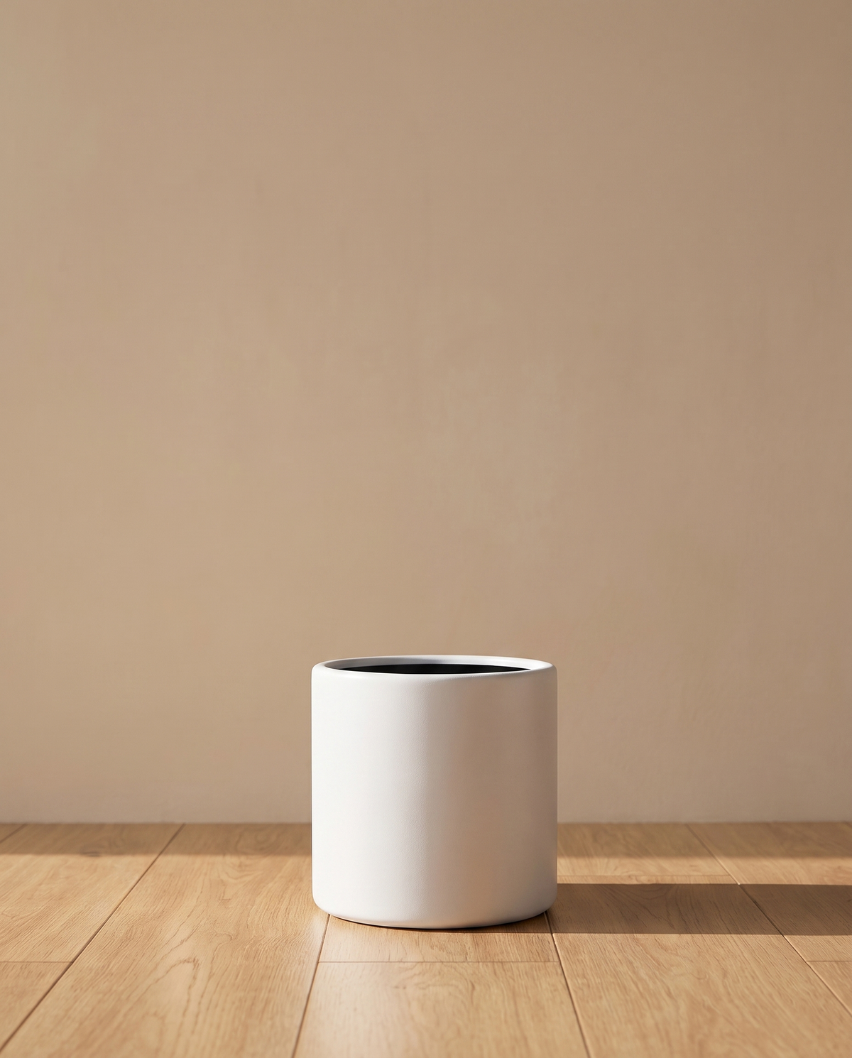 White Matte Metal Planter – main view in a neutral interior