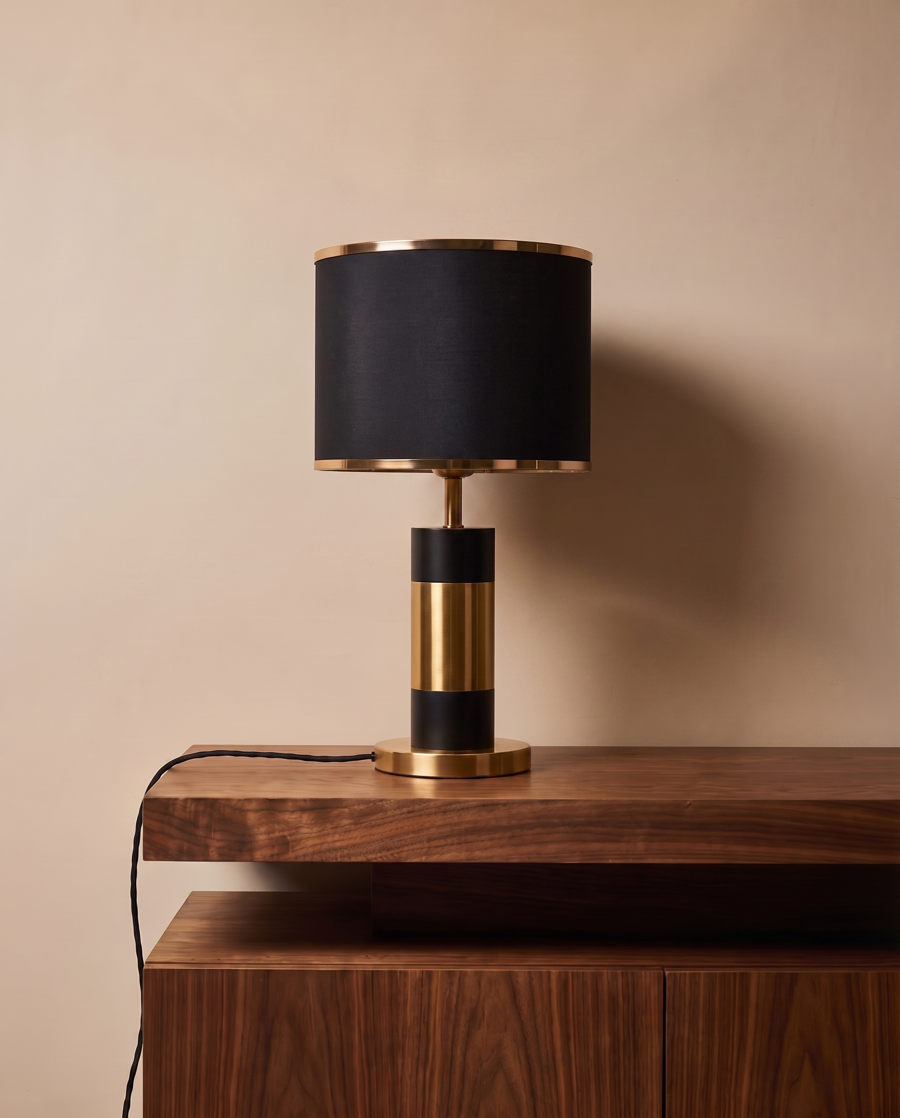 Gold and black table lamp with black shade