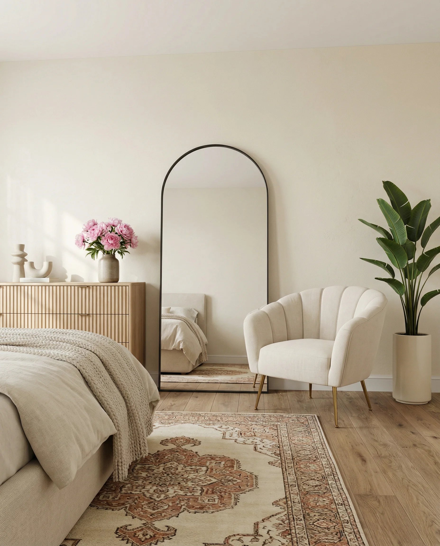 Adriana slim black arch standing mirror in a Dubai bedroom