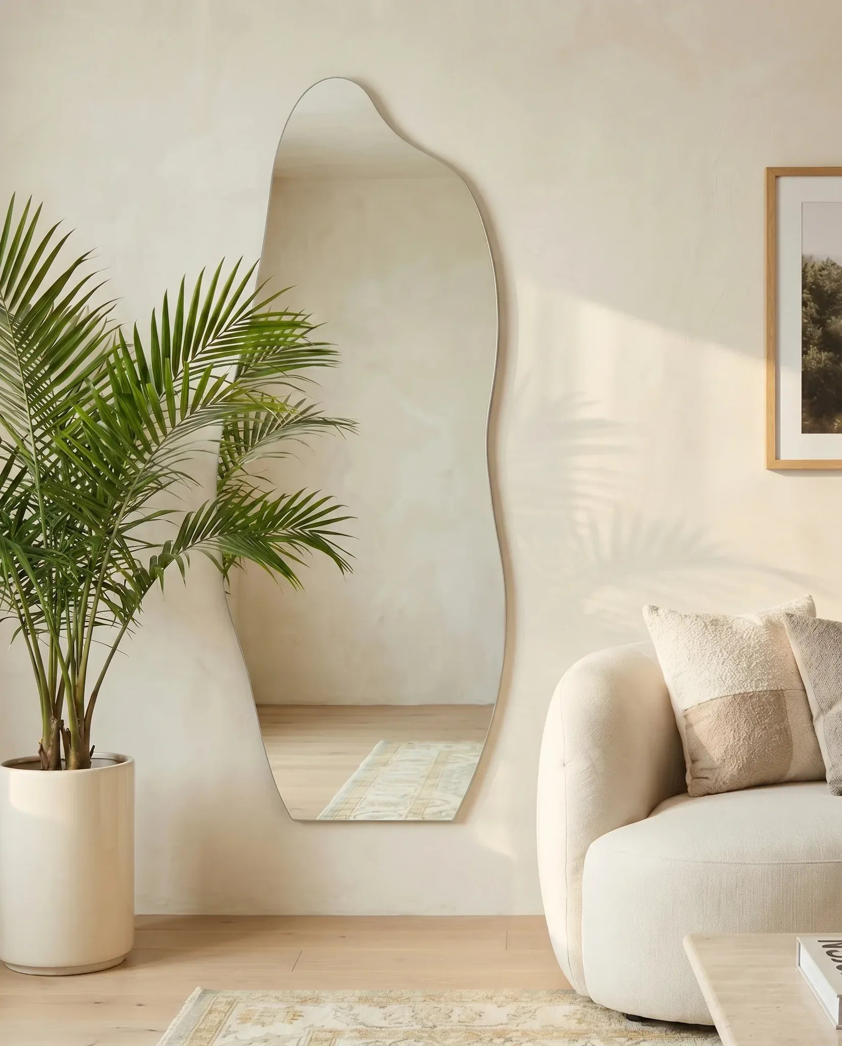 Ariana large wavy frameless mirror, close-up of the polished edge
