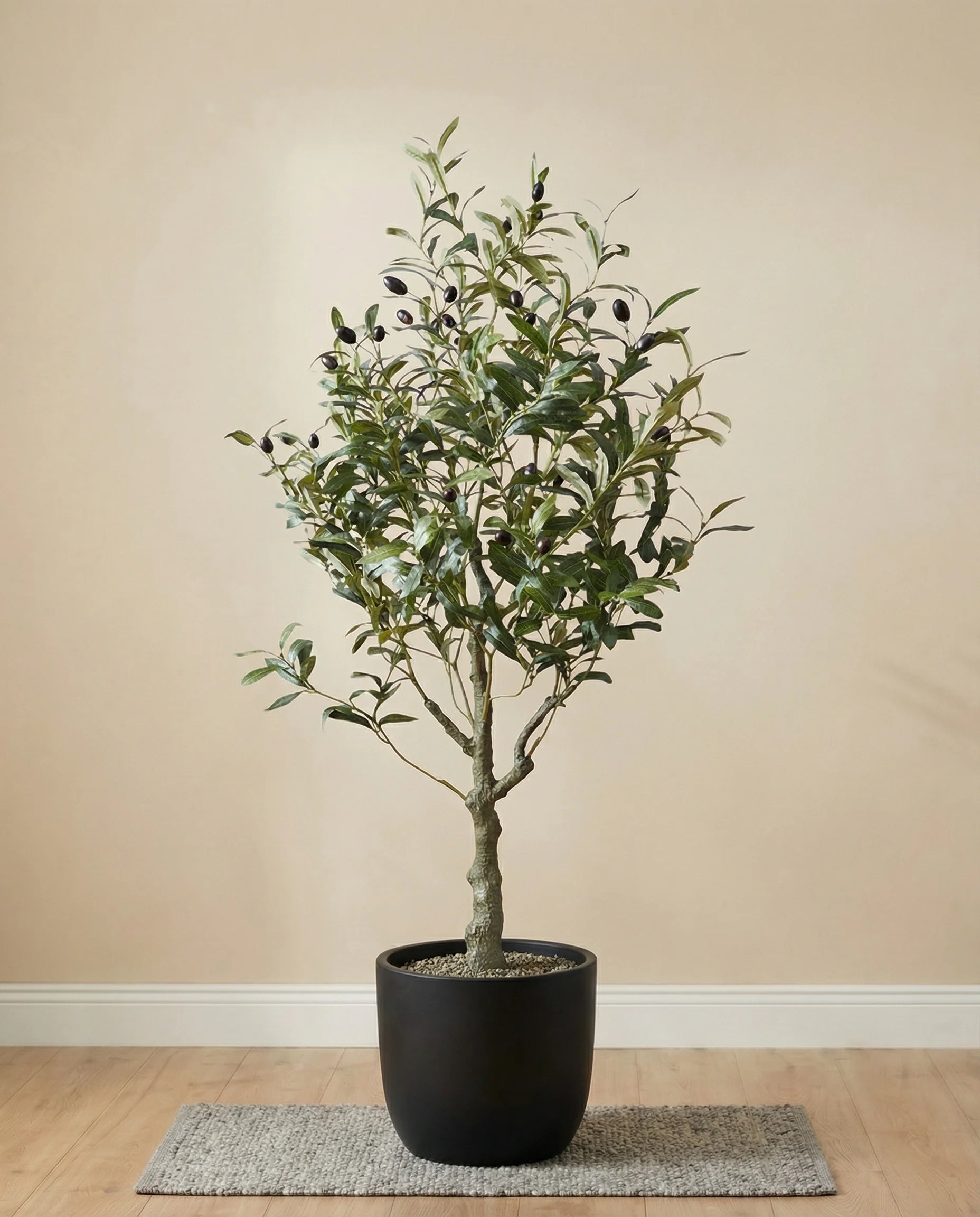 Rustic artificial olive tree with olives