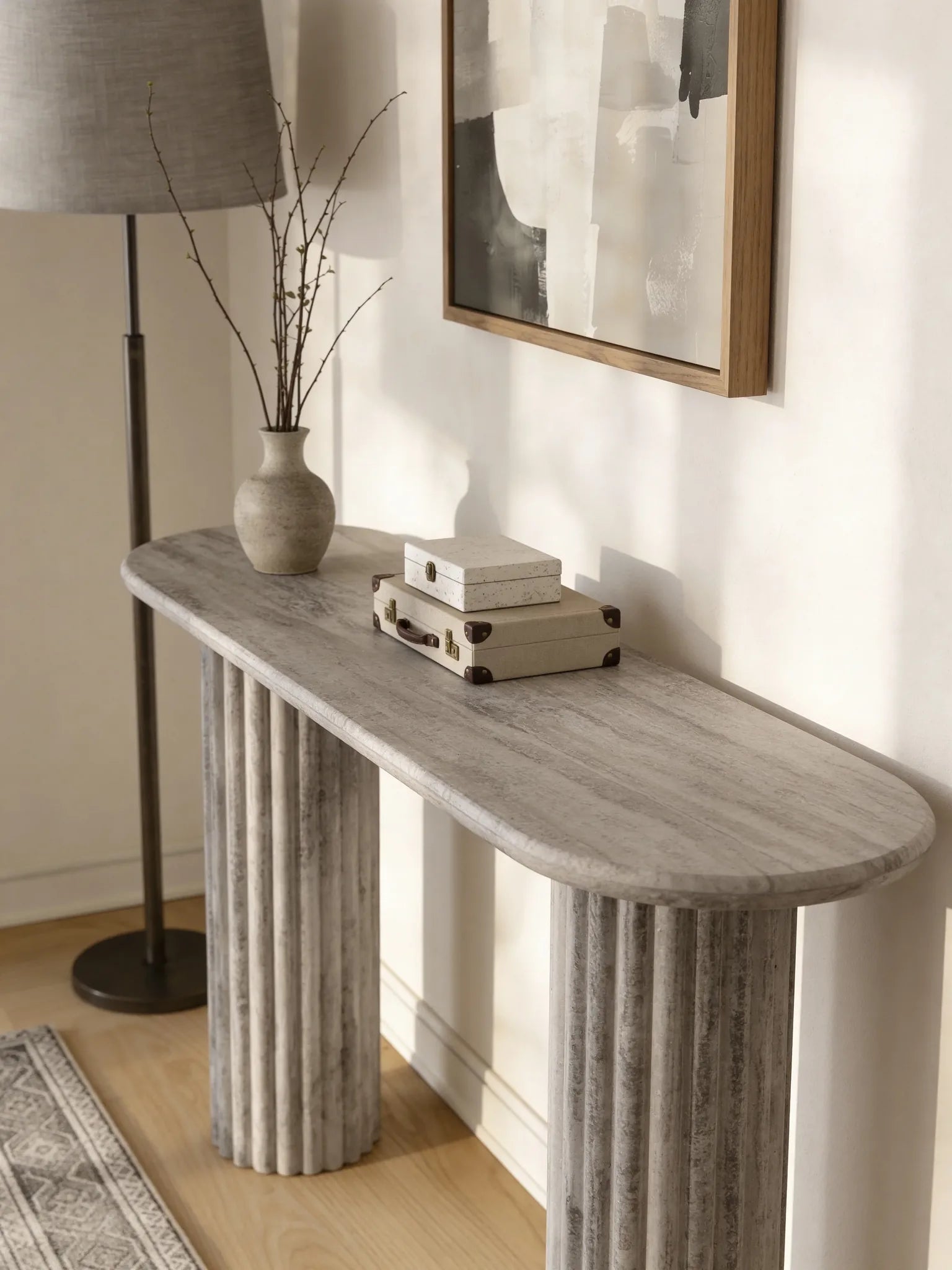 Austin grey travertine console table in a Dubai entryway