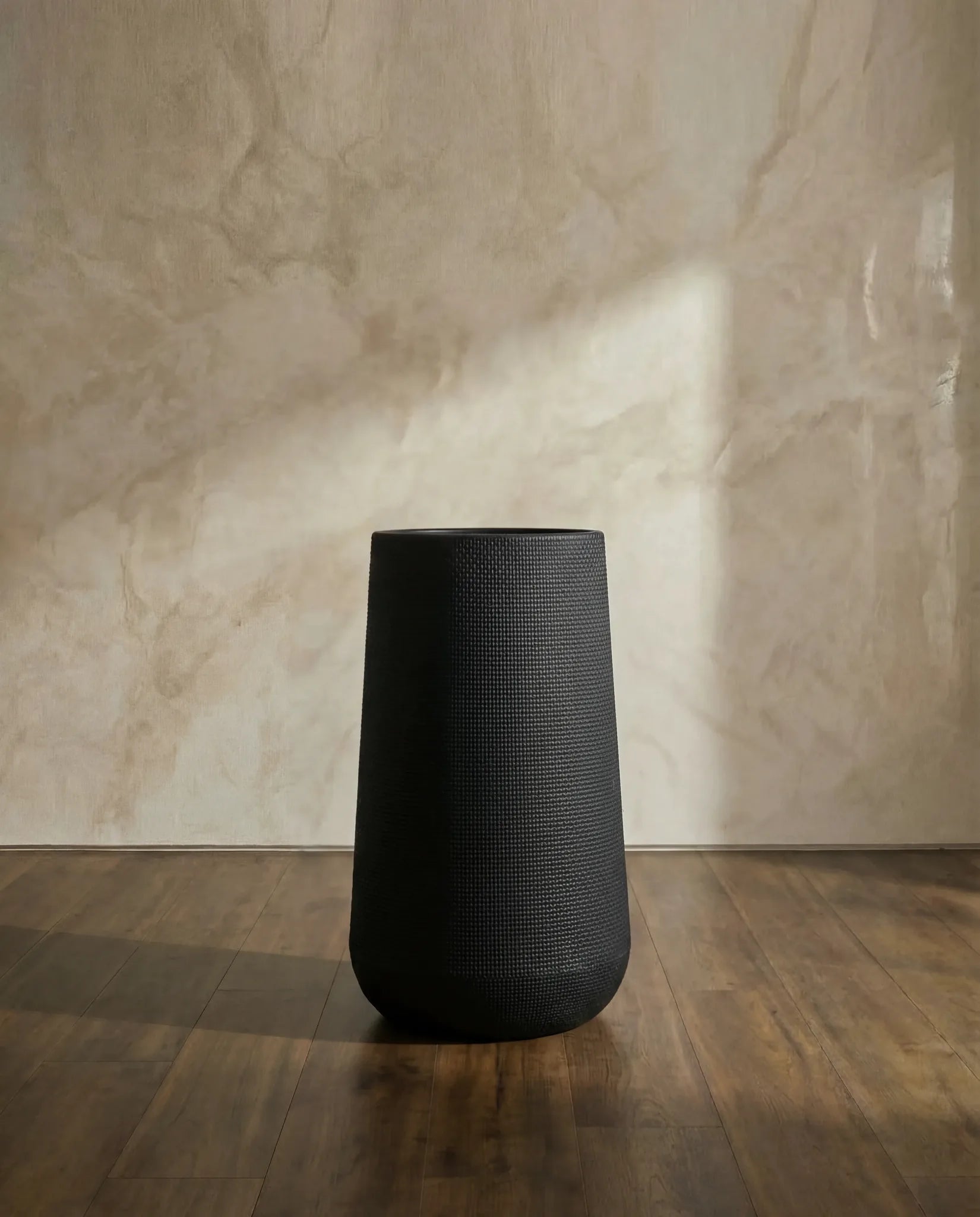 Black Tall Textured Plastic Pot - 64 cm in a Dubai living room