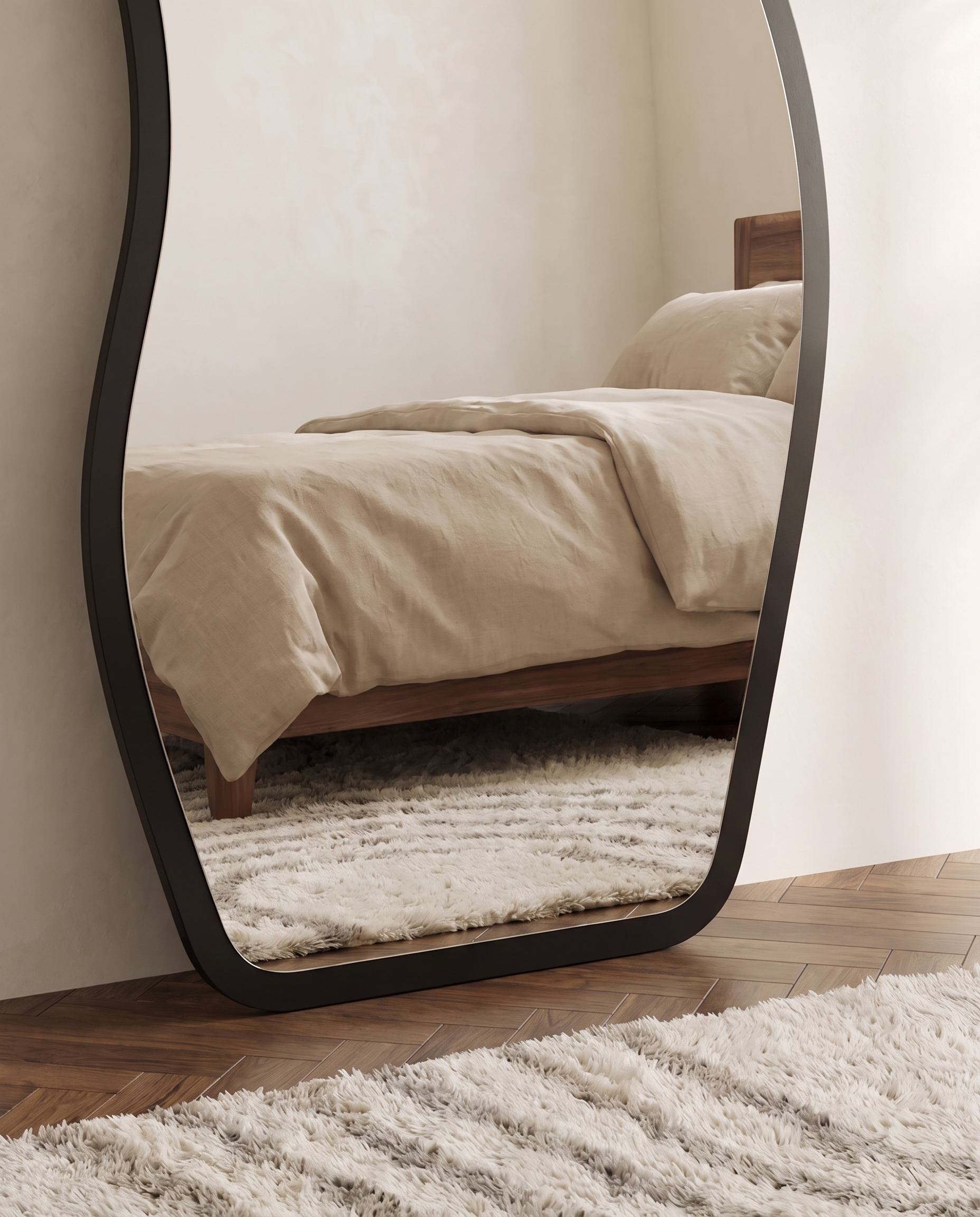 Cassie black irregular floor mirror, close-up of the slim frame