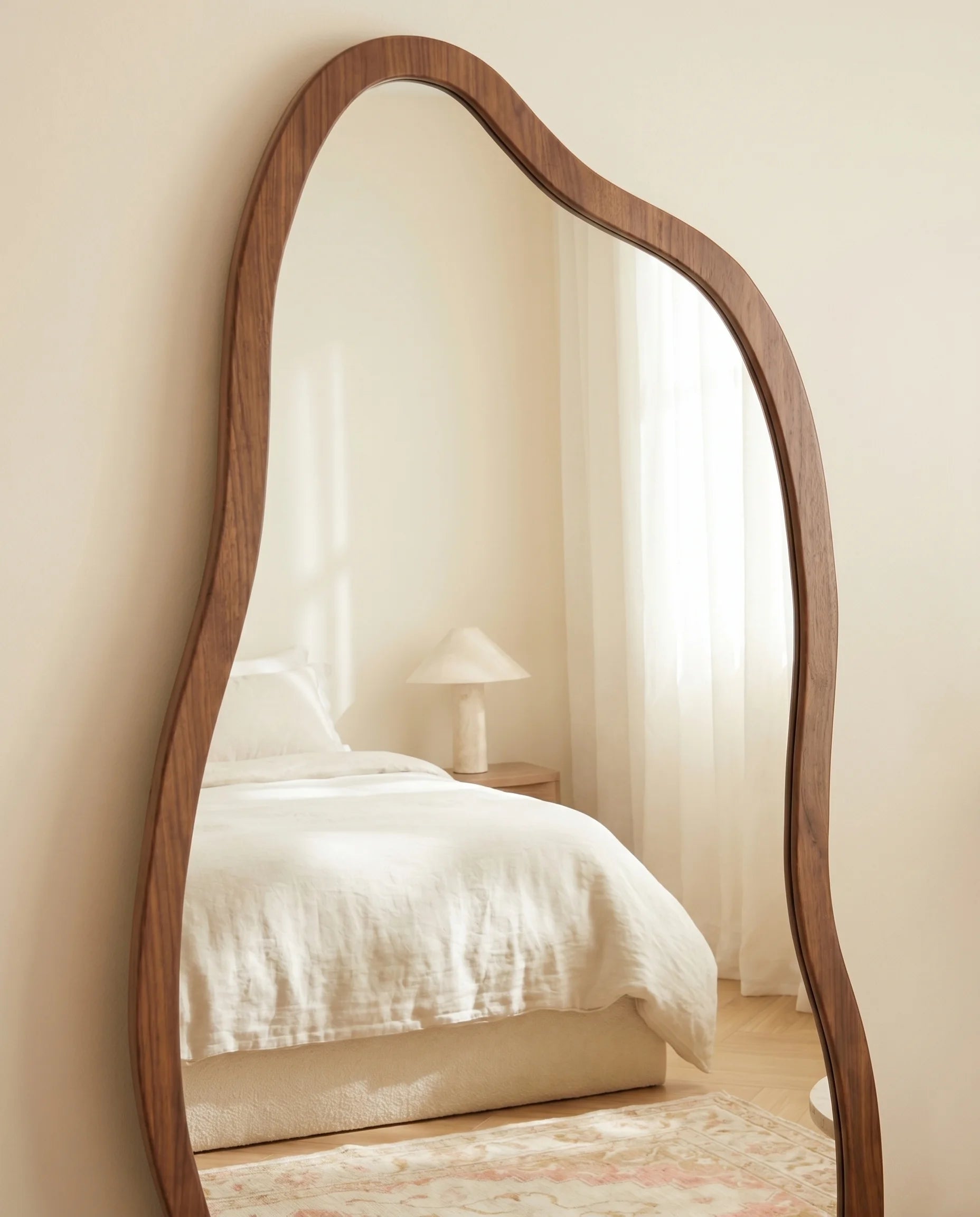 Cassie brown irregular floor mirror, close-up of the slim frame