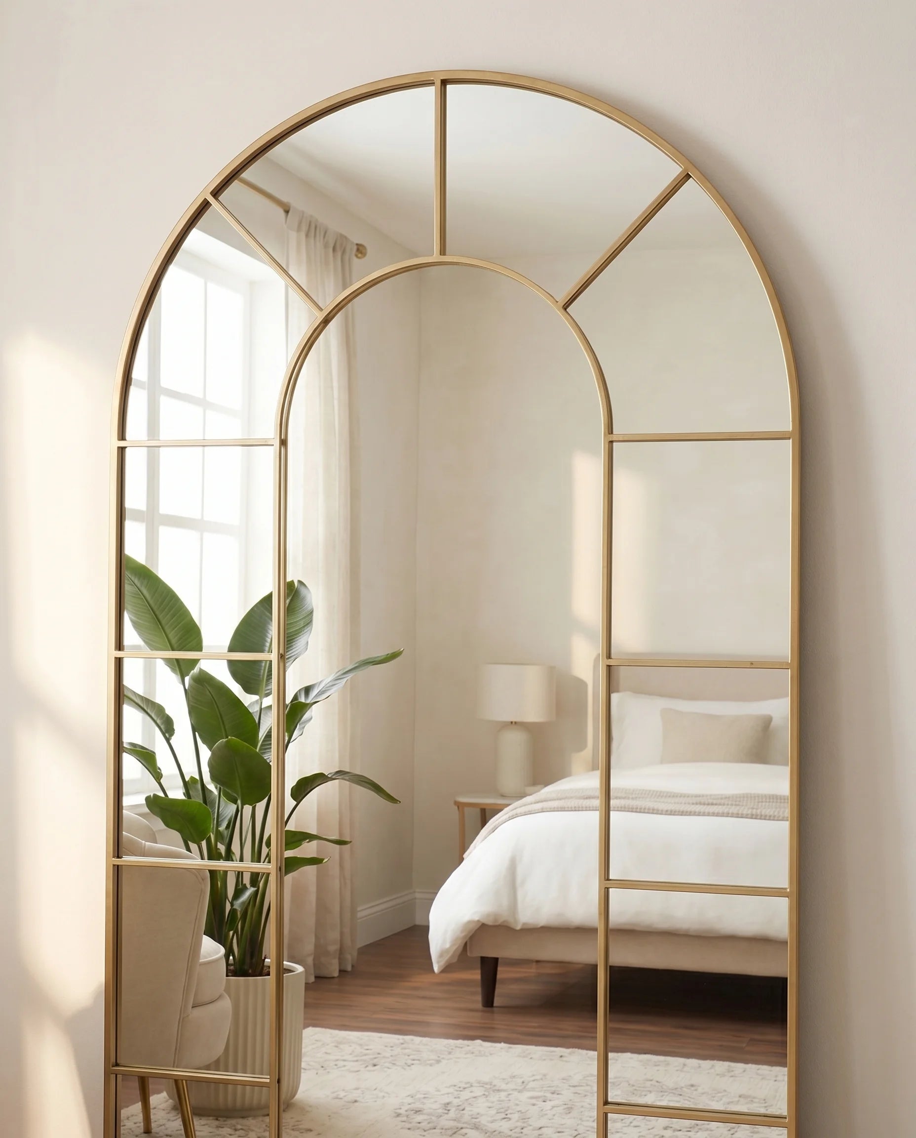 Charles gold window-pane arch mirror, close-up of the grid frame