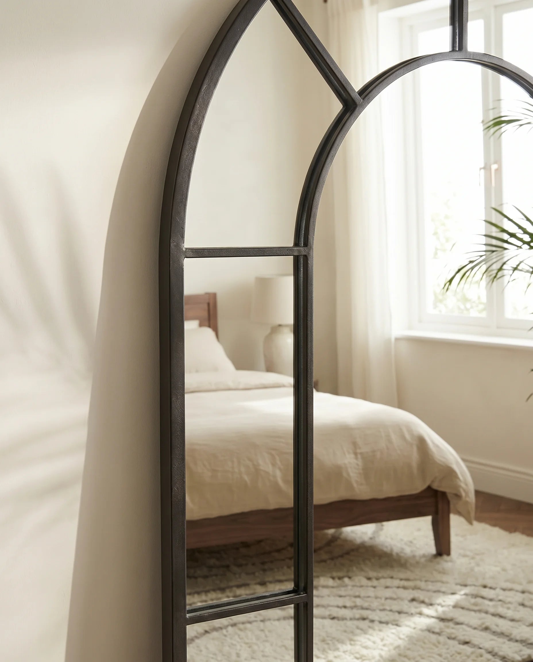 Charles black window-pane arch mirror, close-up of the grid frame