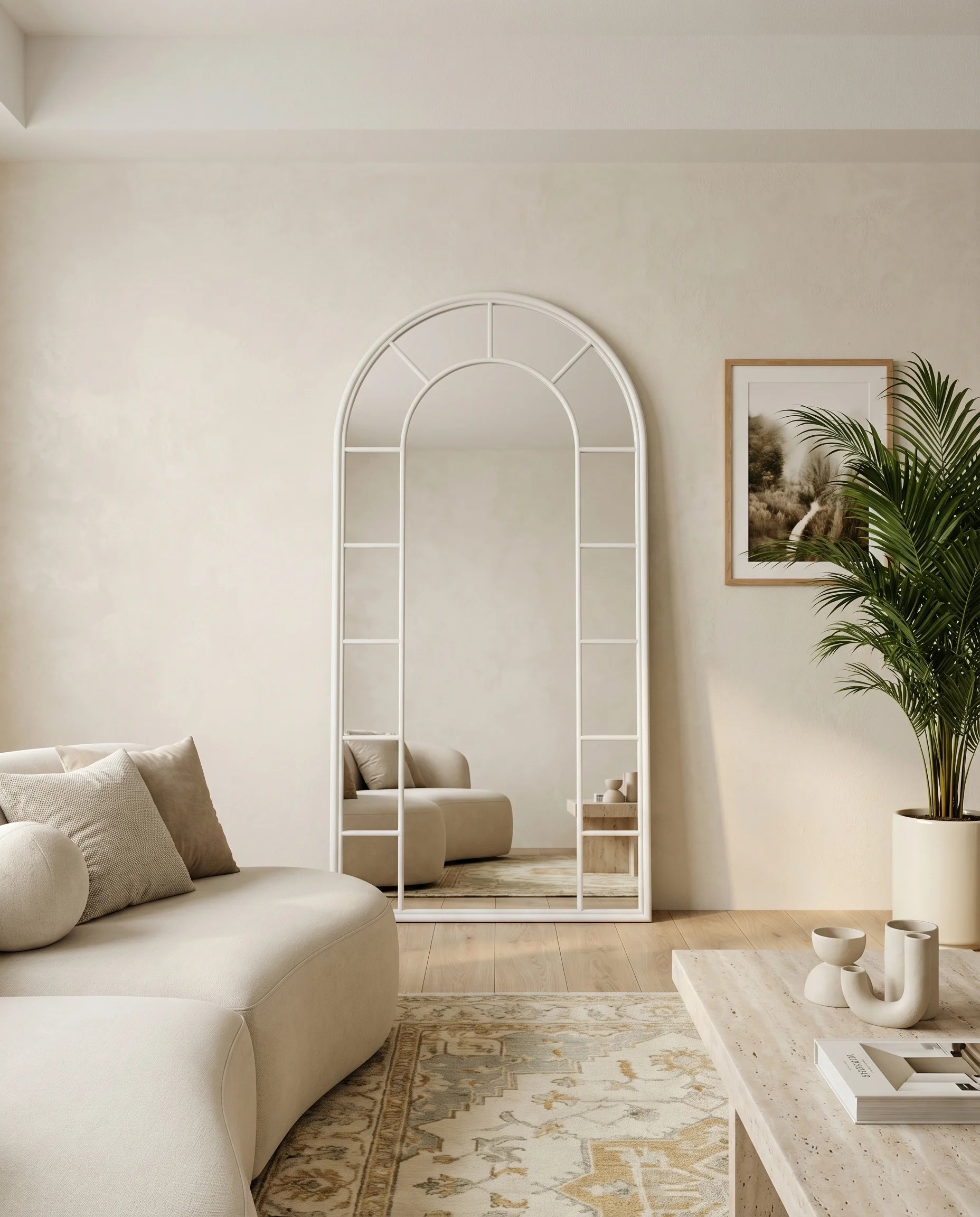 Charles silver window-pane arched mirror in a Dubai living room