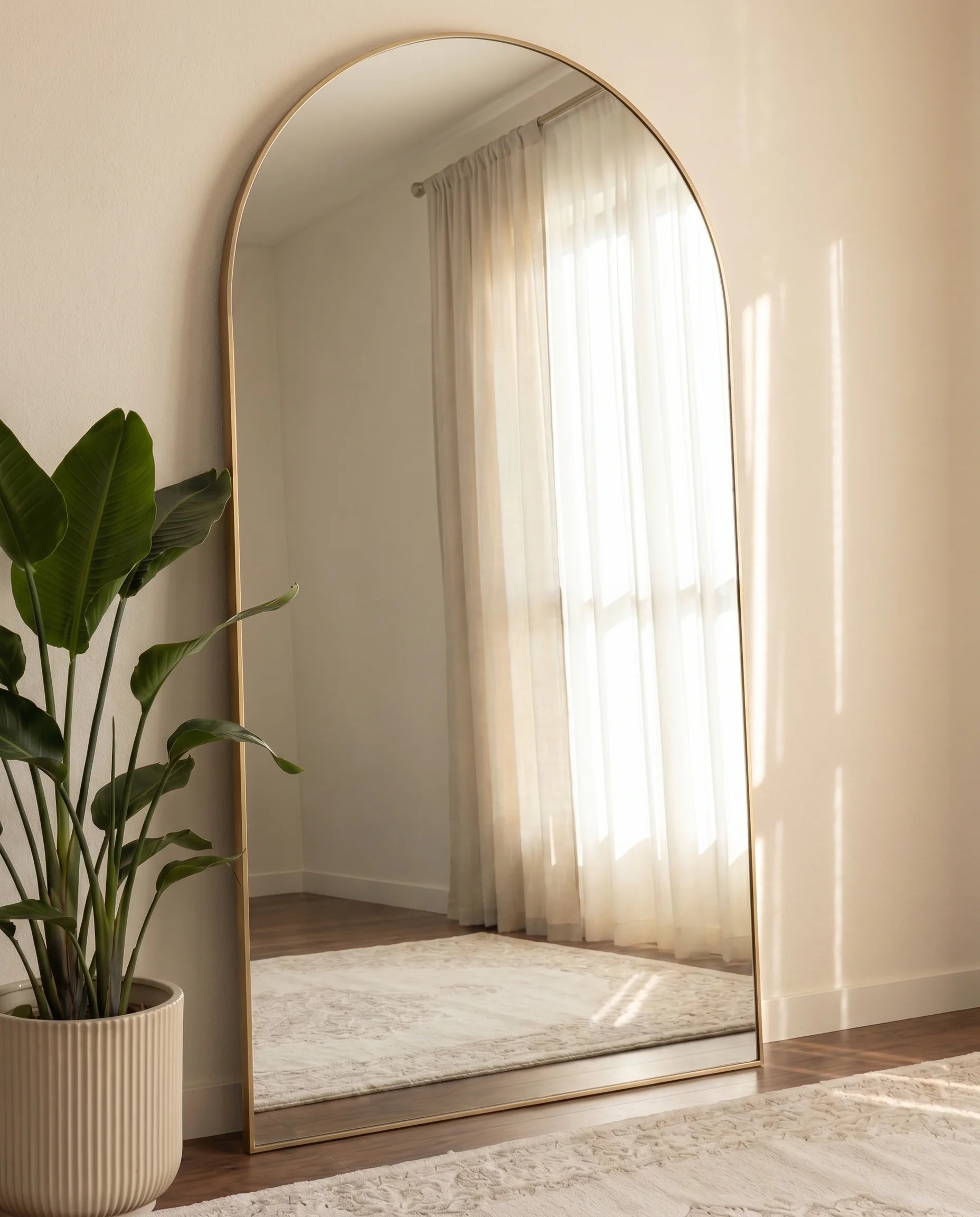 Diana large arched wall mirror with golden frame