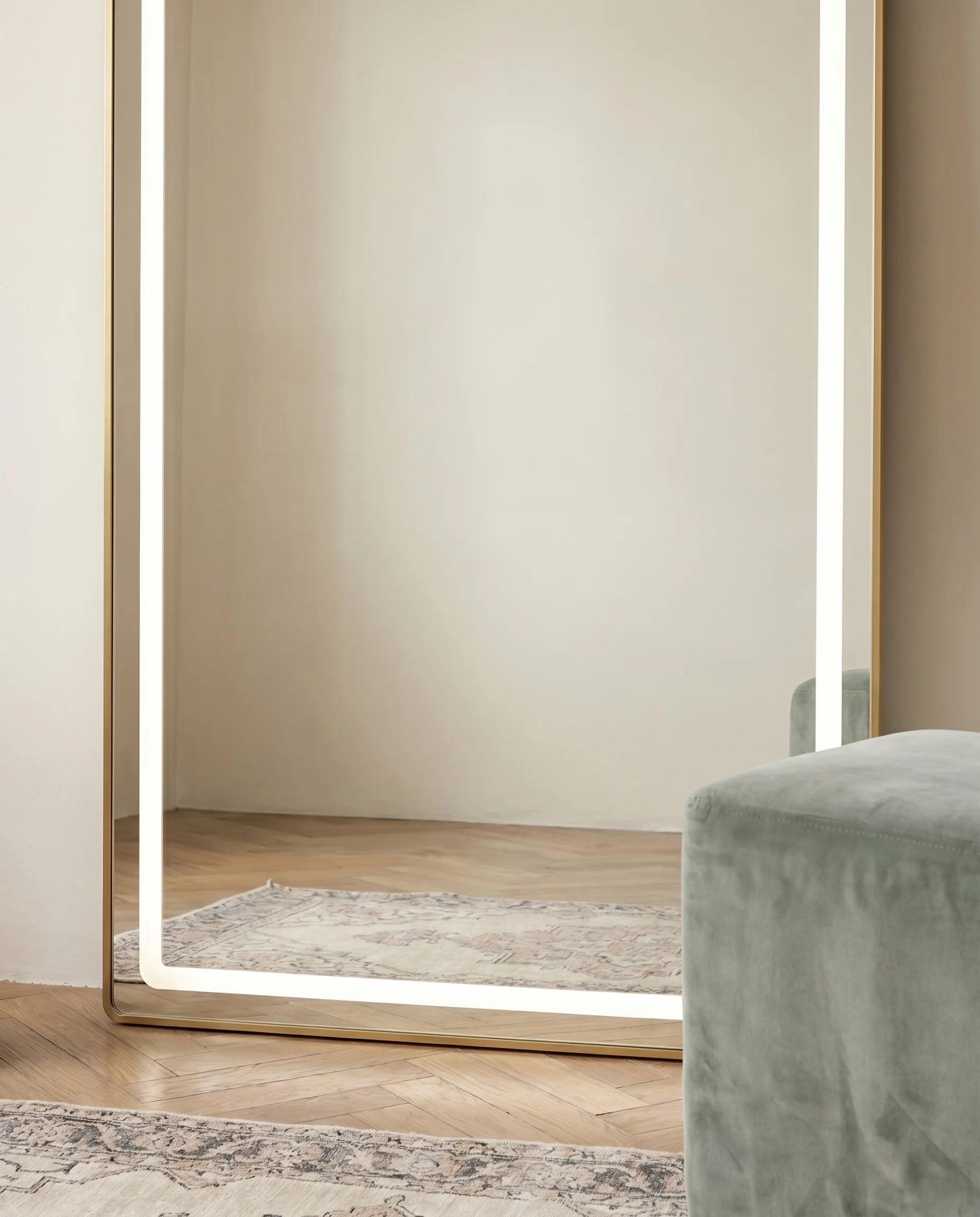 Diana gold LED arched wall mirror, close-up of the touch light