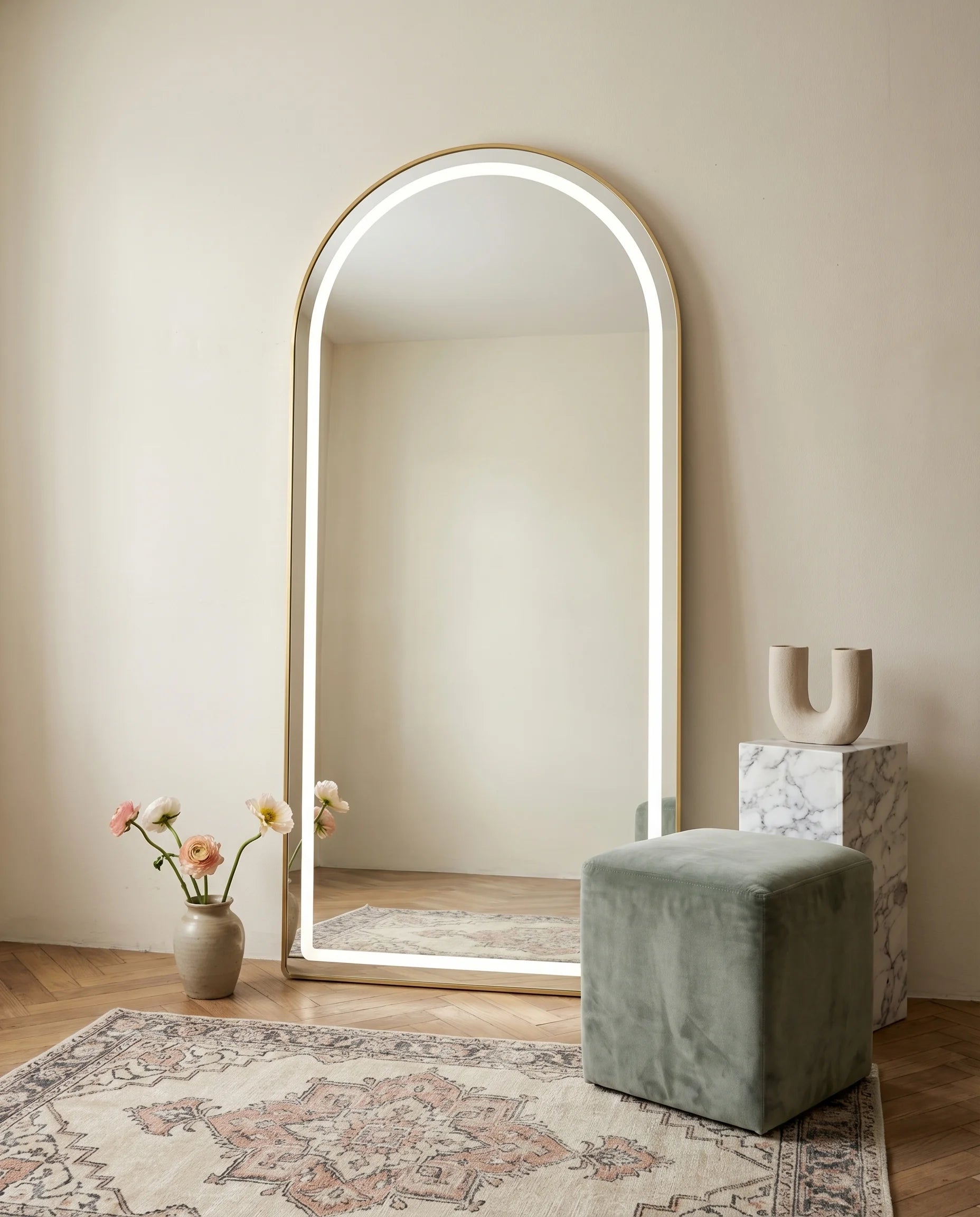 Diana gold LED arched wall mirror in a Dubai living room