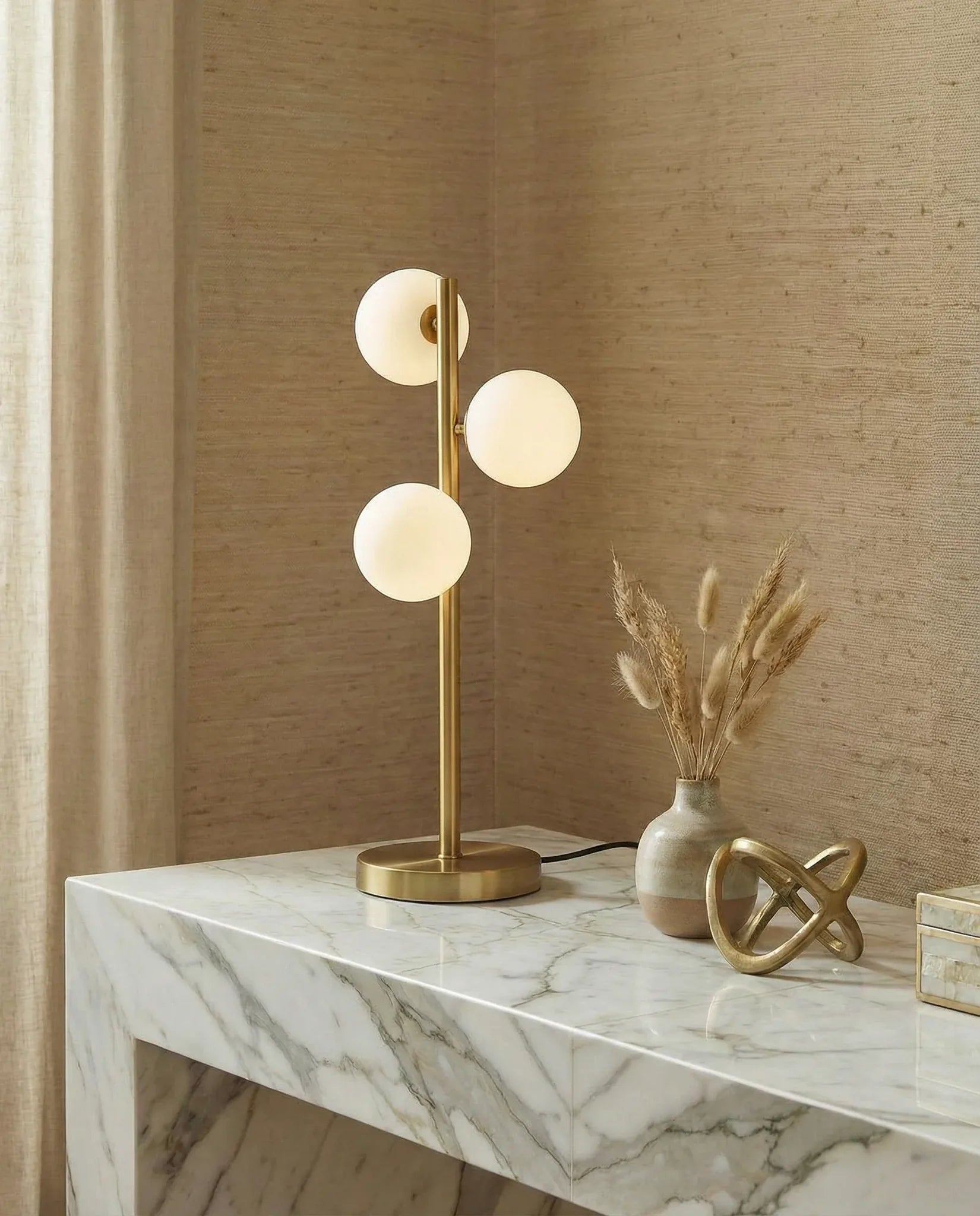 Francisco mid-century gold table lamp with three frosted glass orbs