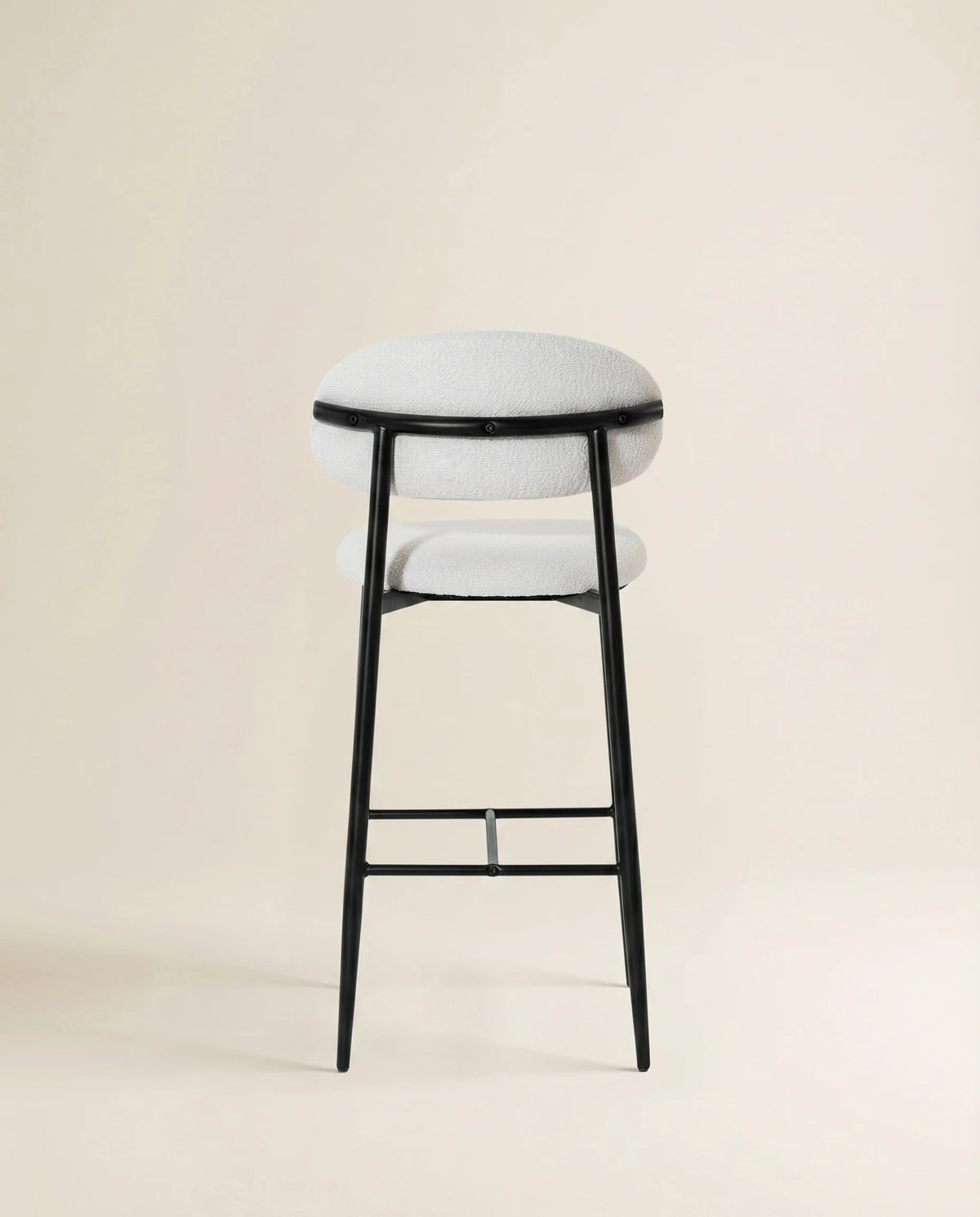 Halo soft white bouclé bar stool at a Dubai kitchen island