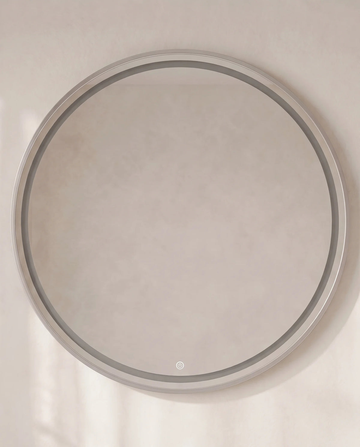 Lavish silver LED round mirror in a Dubai bathroom