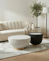 Luxe marbled round coffee table set in a Dubai living room