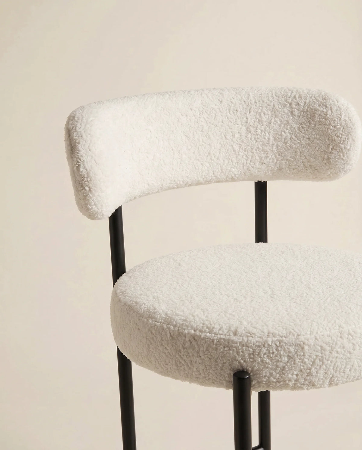 Bouclé bar stool, close-up of the looped seat