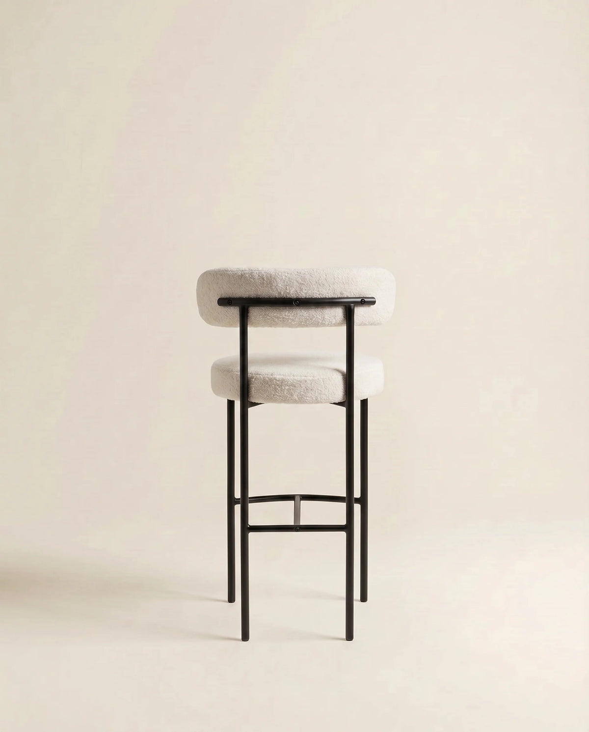 Mabel bouclé bar stool at a Dubai kitchen island