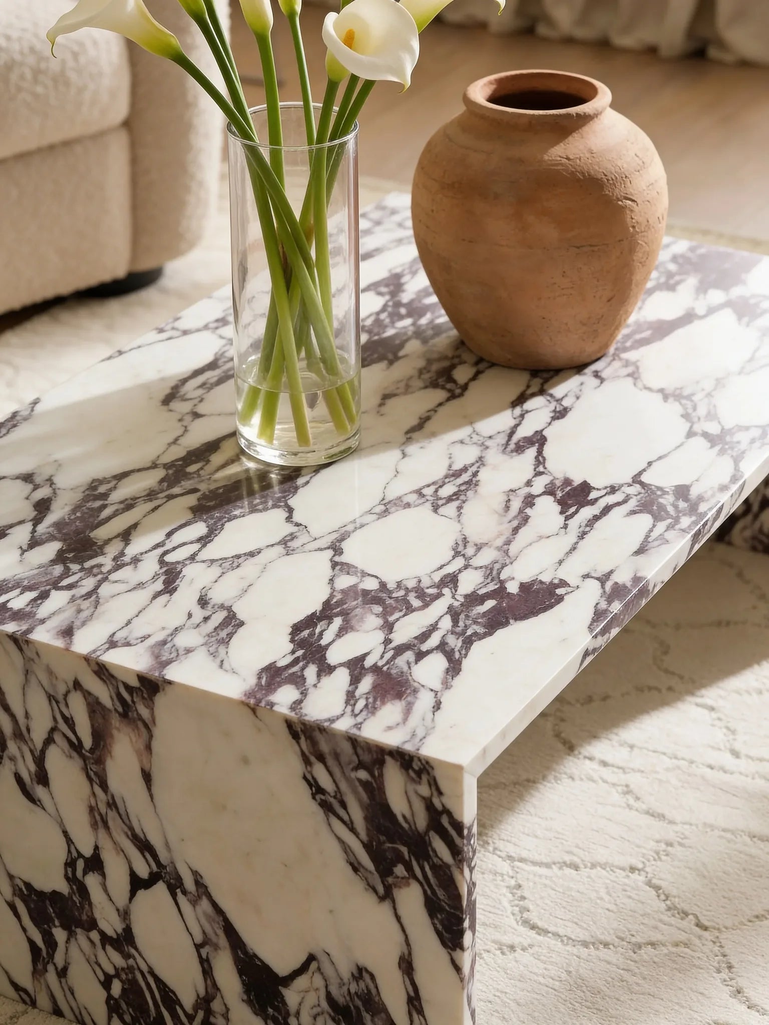 Calacatta marble coffee table, close-up of the grey veining