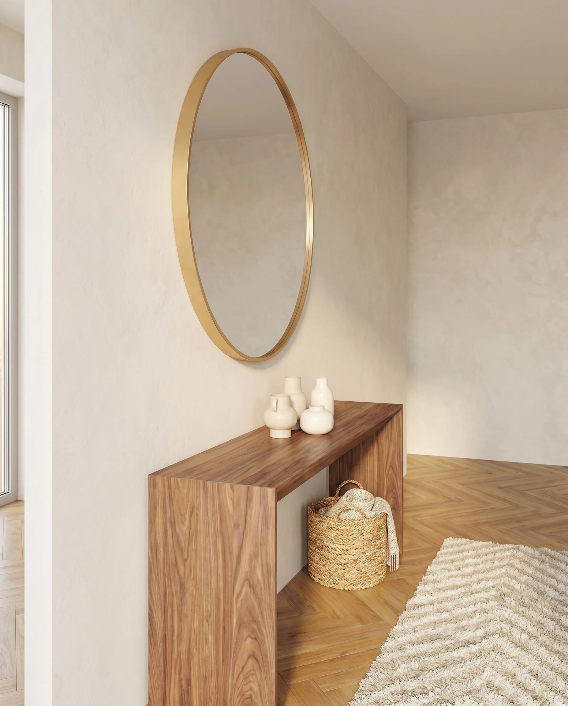 Modern gold round wall mirror in a Dubai bathroom