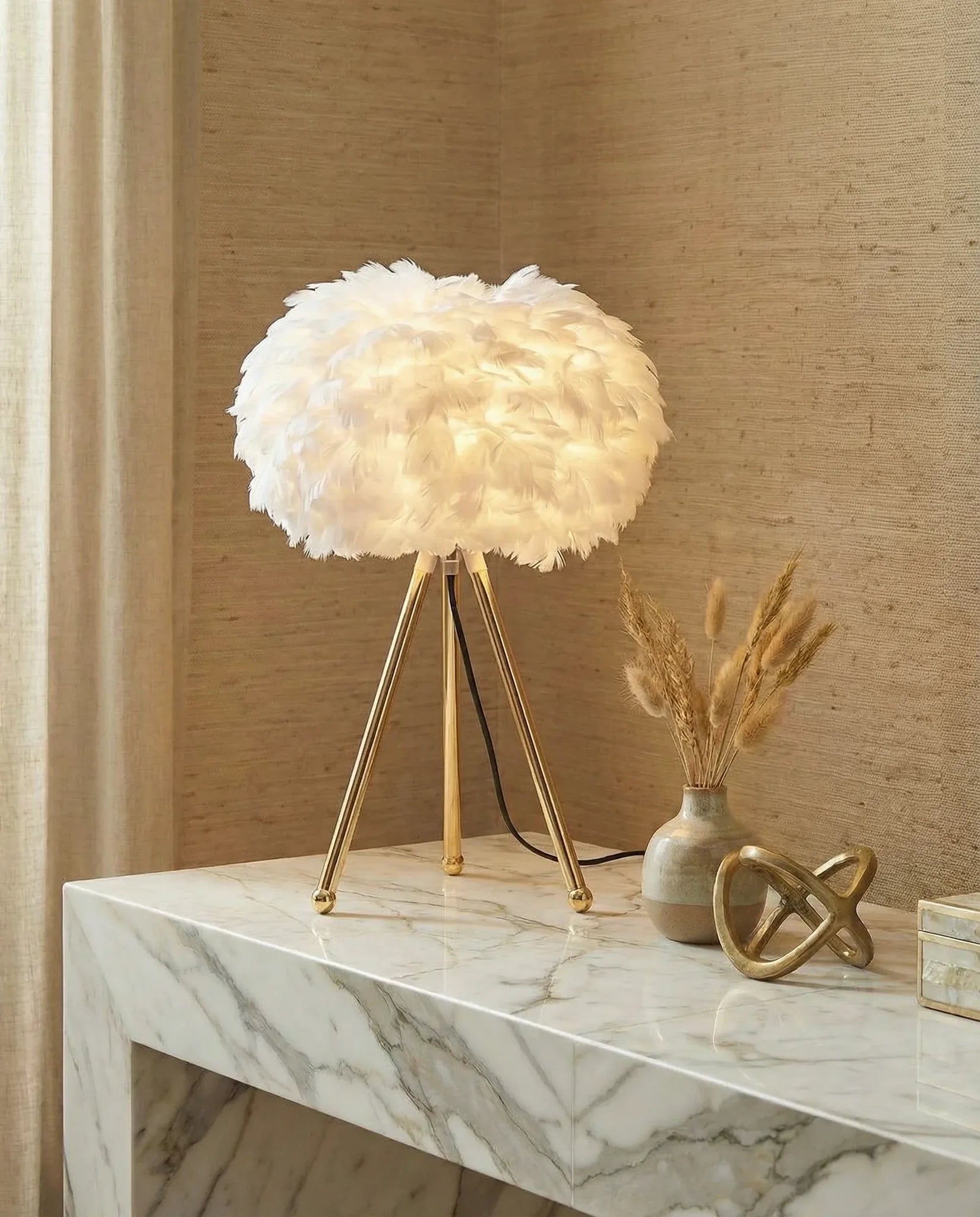 Natural ostrich feather tripod table lamp on golden legs