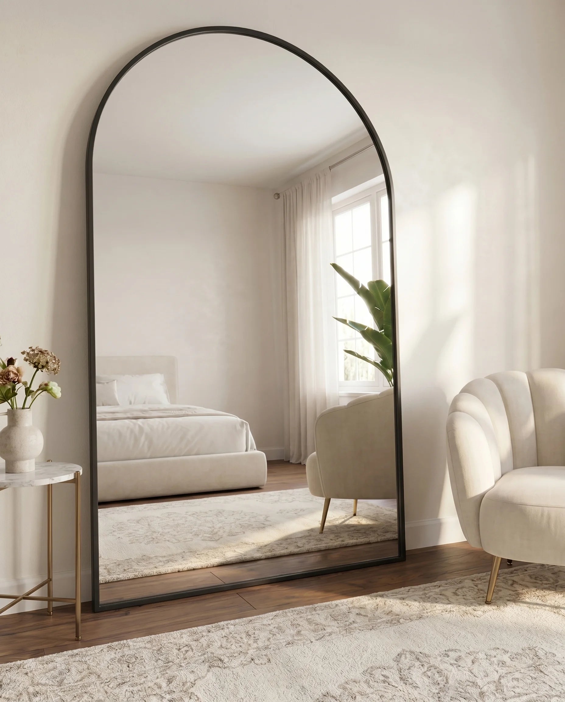 Raphael large arched black frame mirror in a Dubai living room