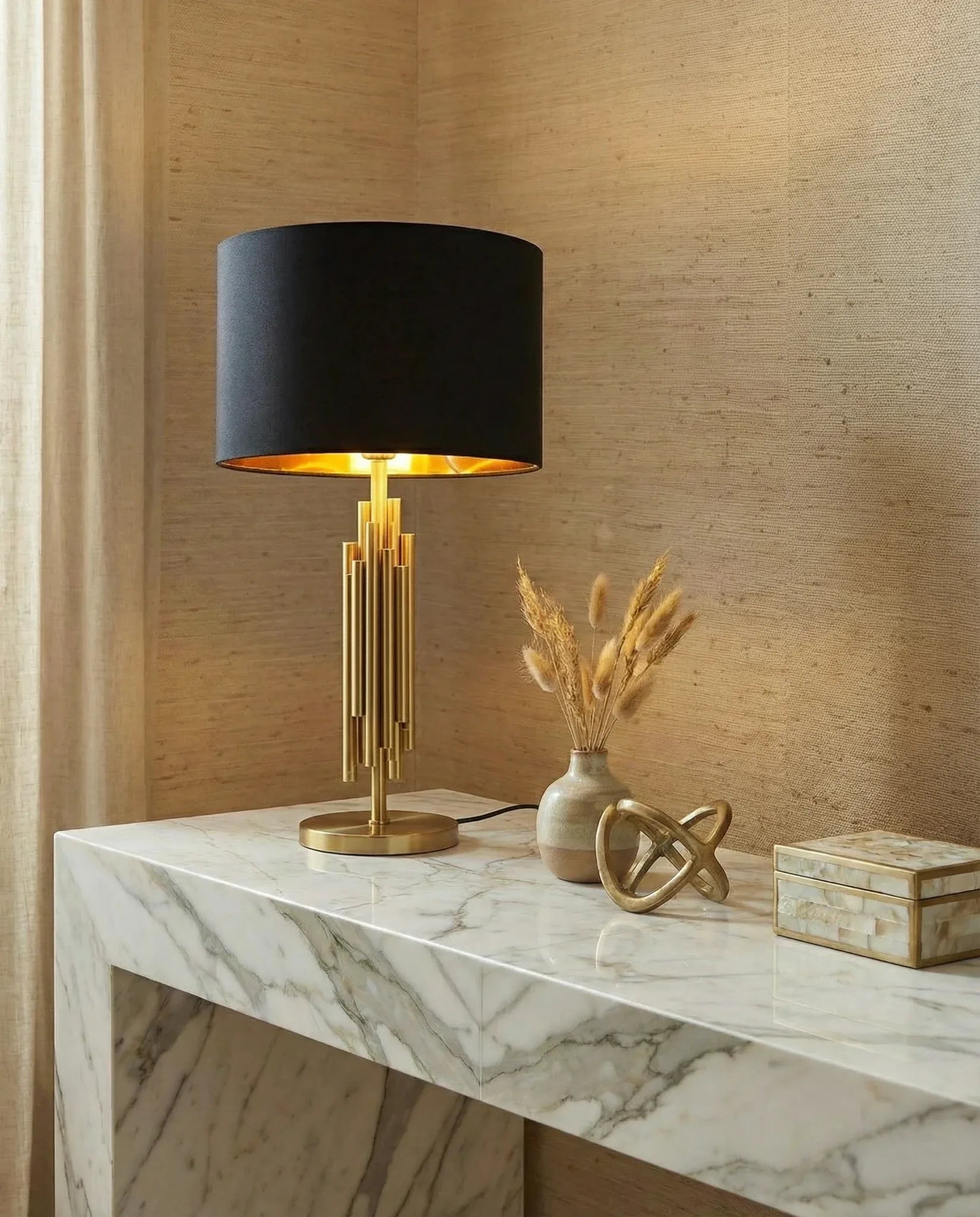 Regal black and gold bedside table lamp with tiered stand