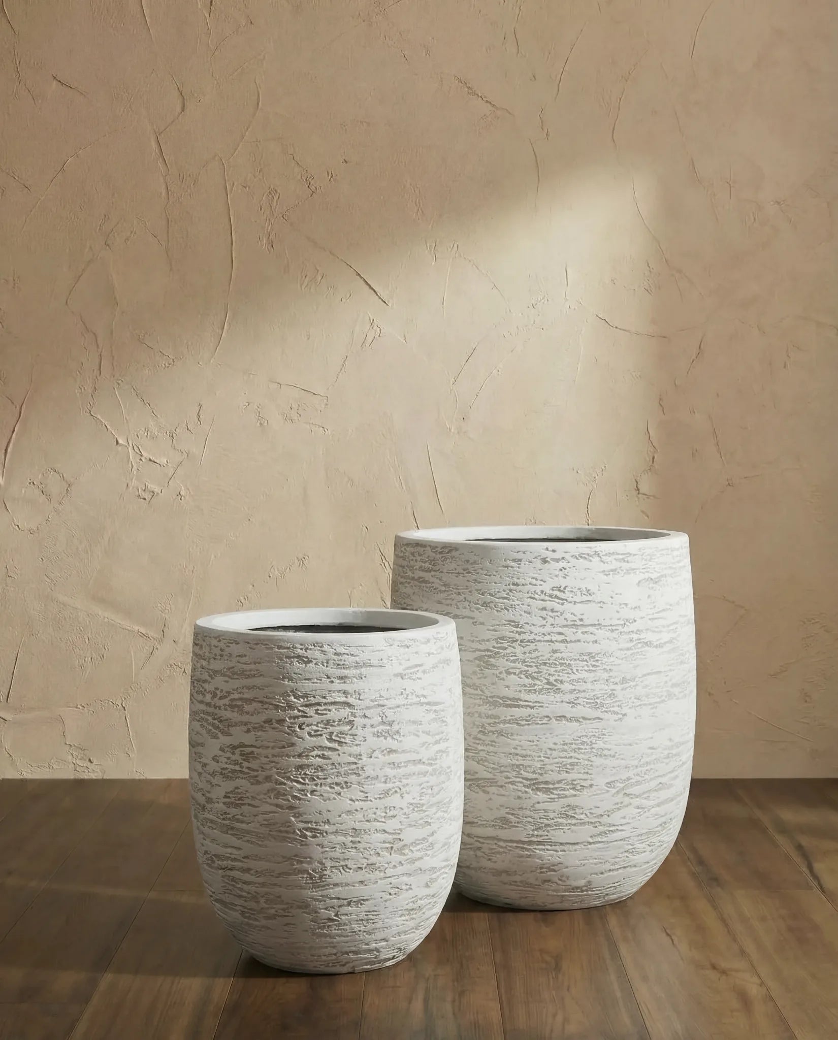 Snowy White Fibreclay Planters in a Dubai living room