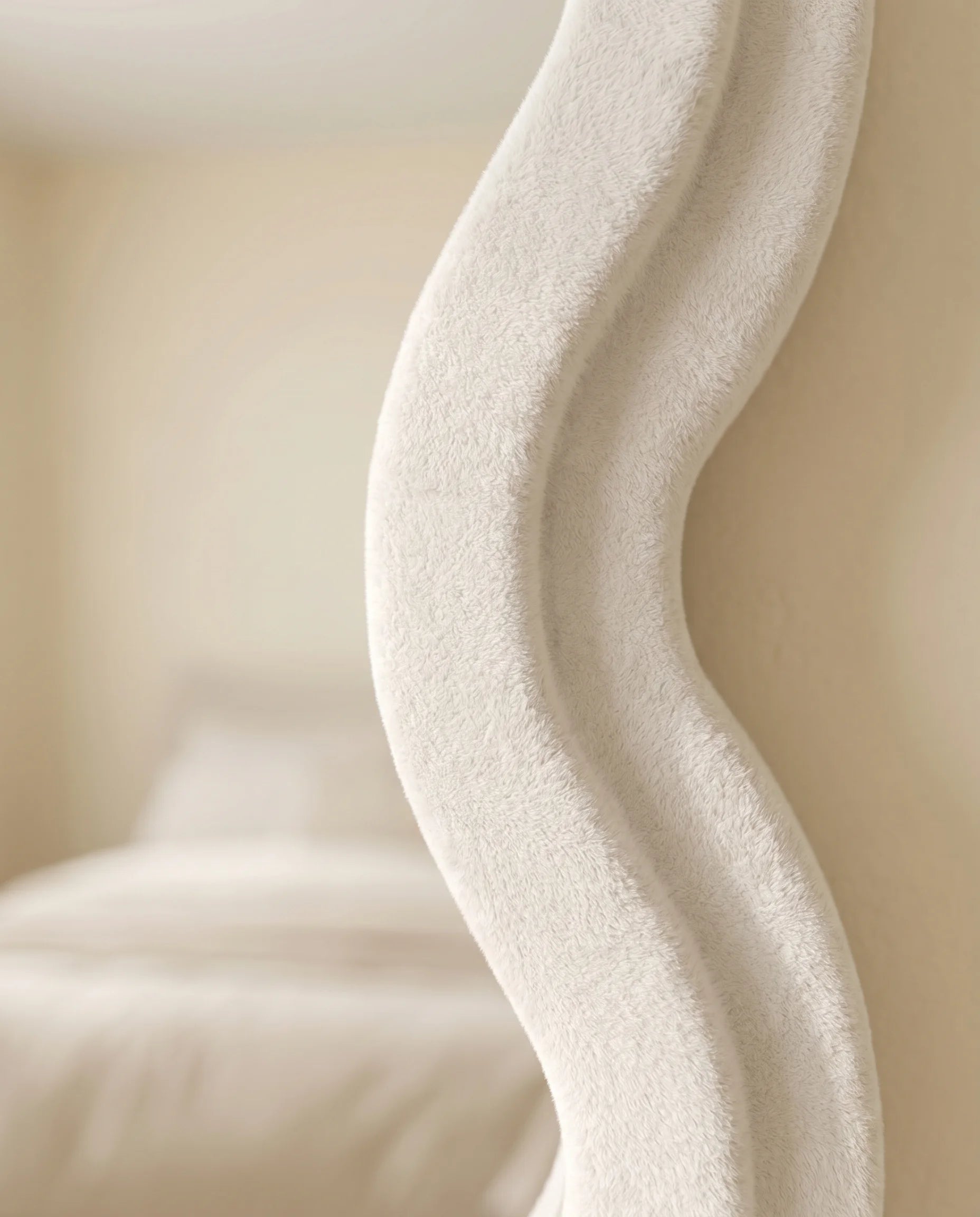Vienna white wavy full-body mirror, close-up of the fabric frame