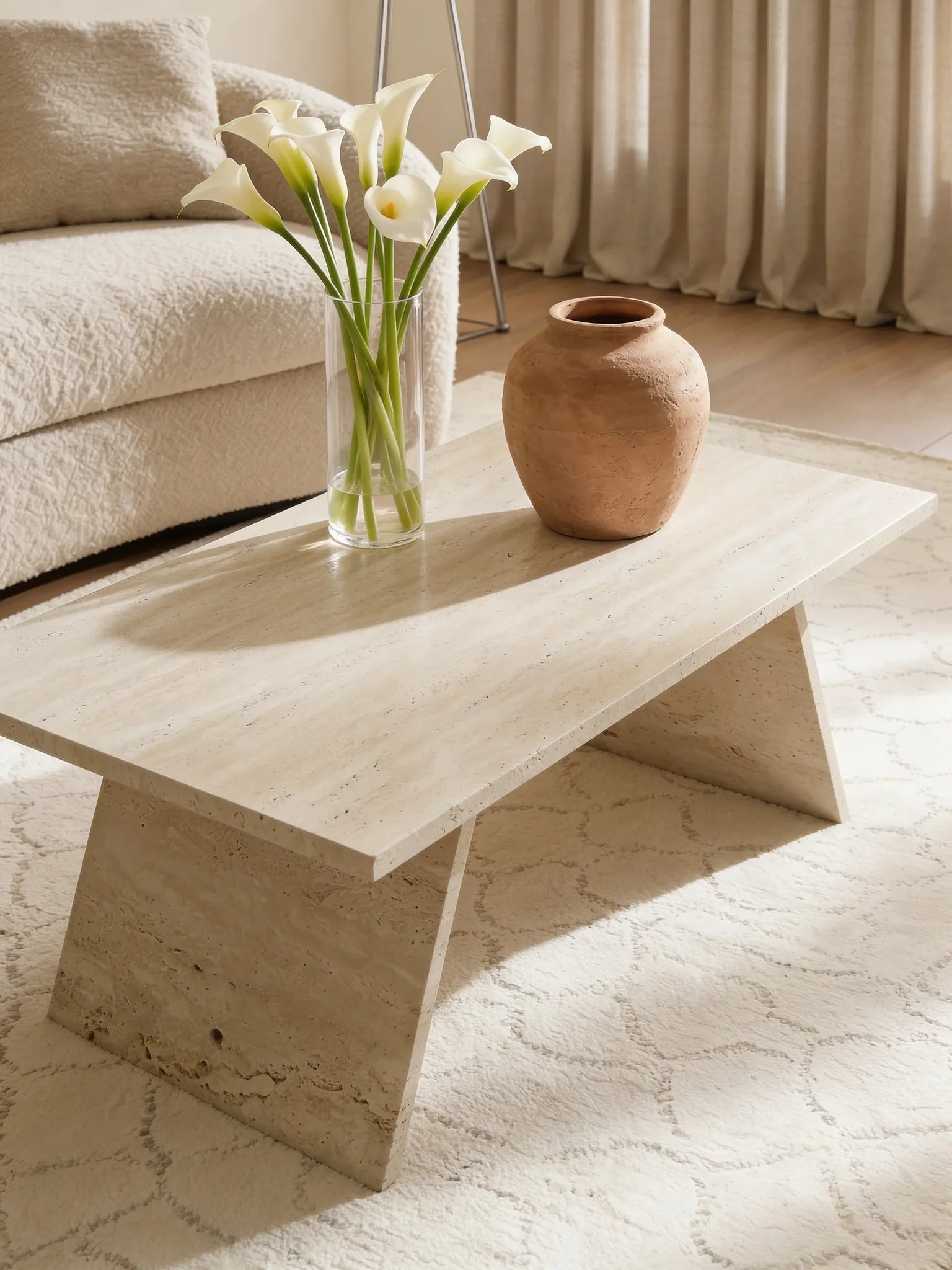 Winston travertine coffee table, close-up of the warm beige stone