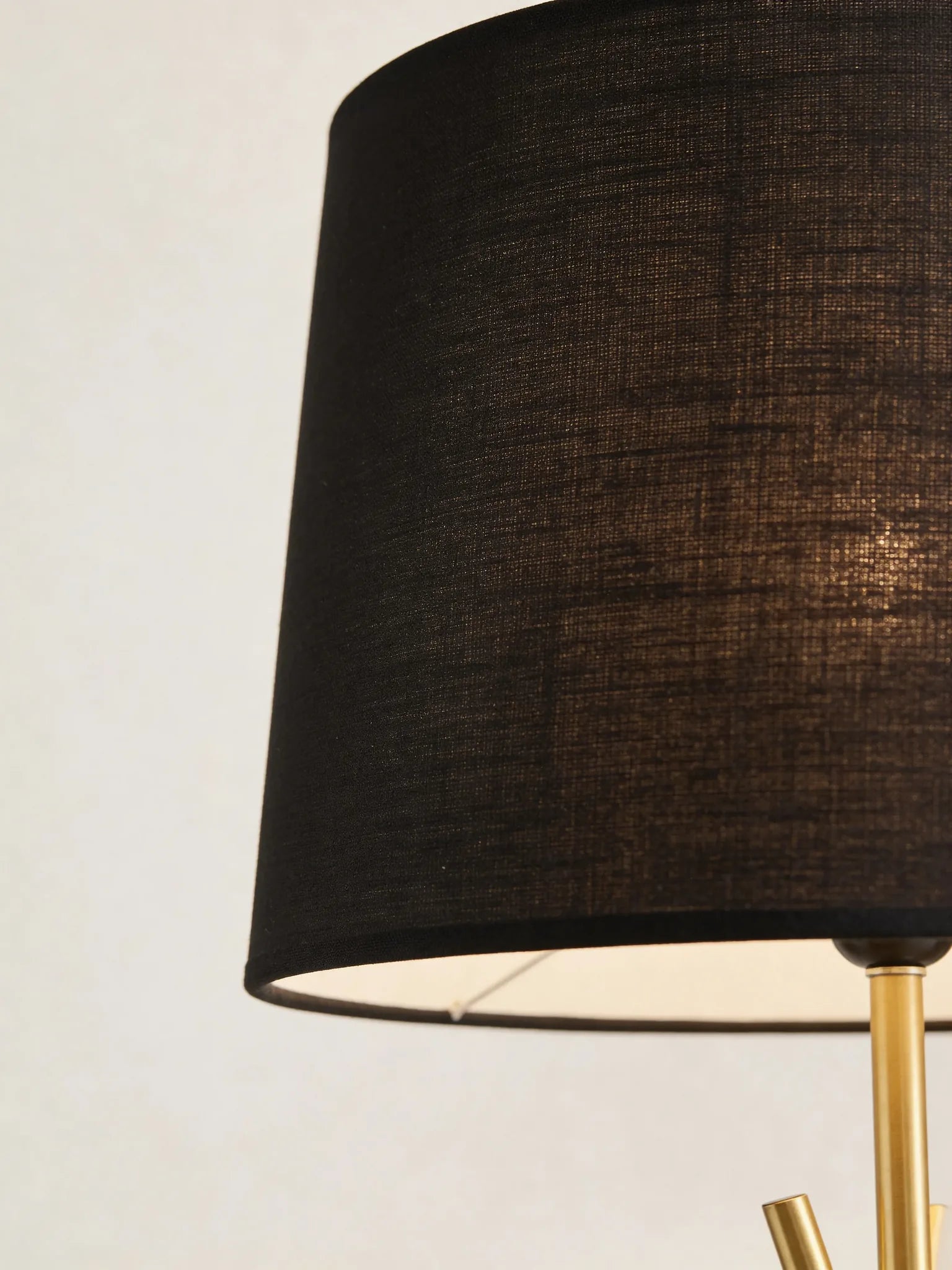 Tripod floor lamp in a Dubai living room
