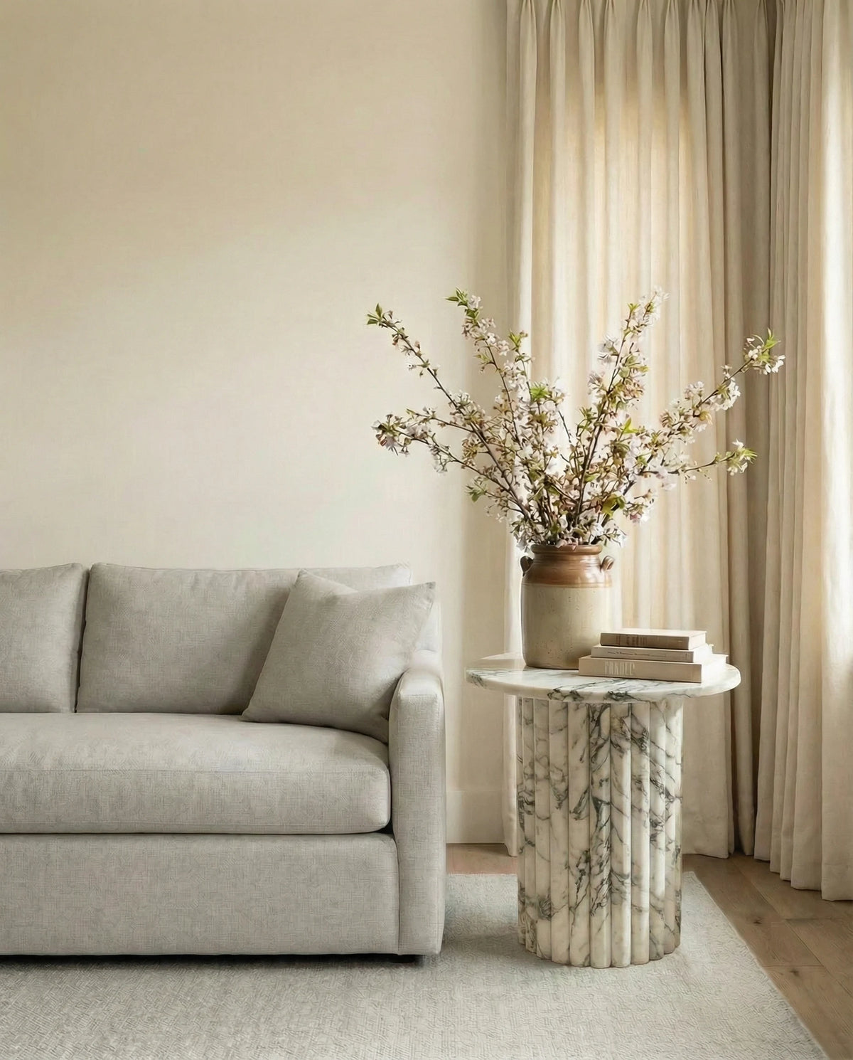 Arabescato marble accent table in a Dubai living room