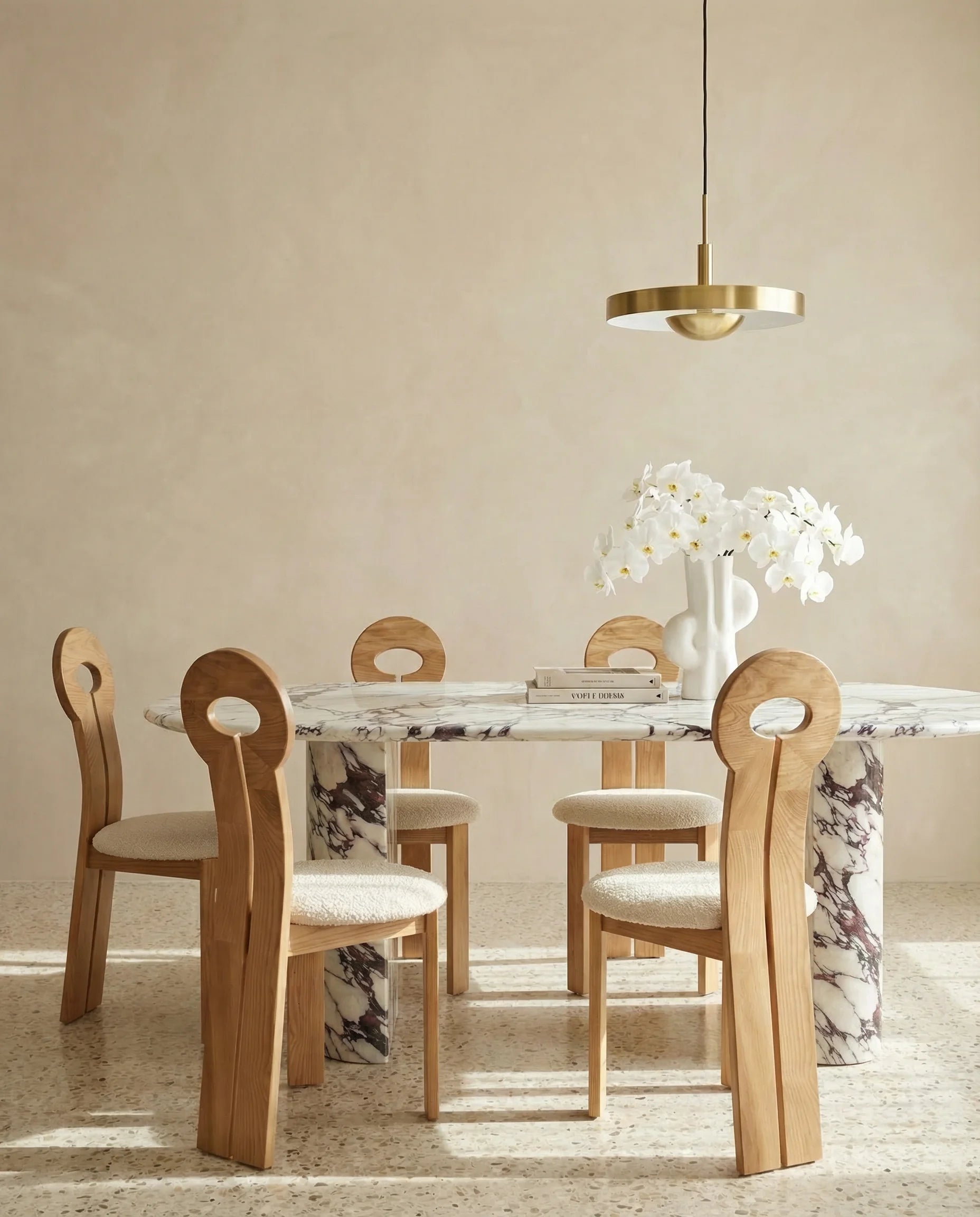 Calacatta dining table, close-up of the half-moon base