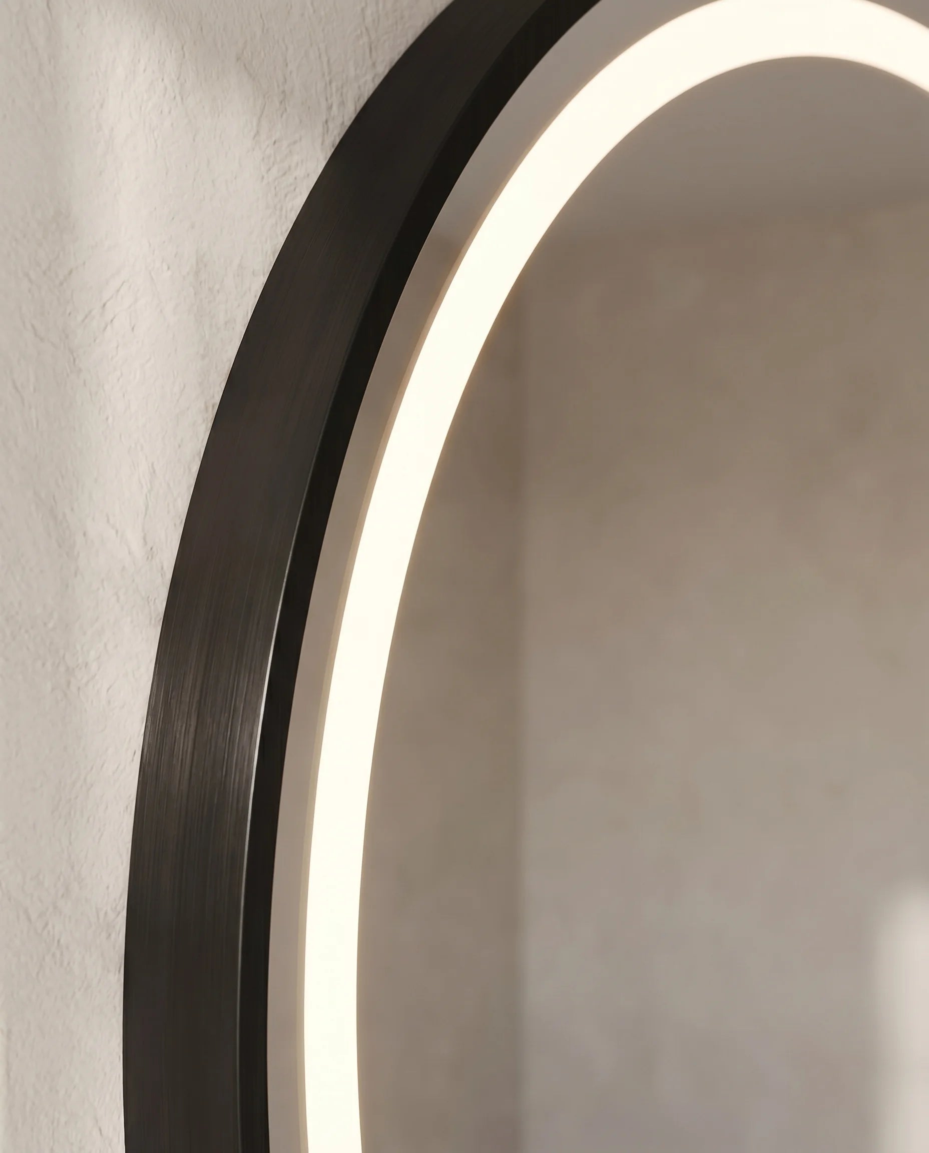 Avery black LED round accent mirror in a Dubai hallway