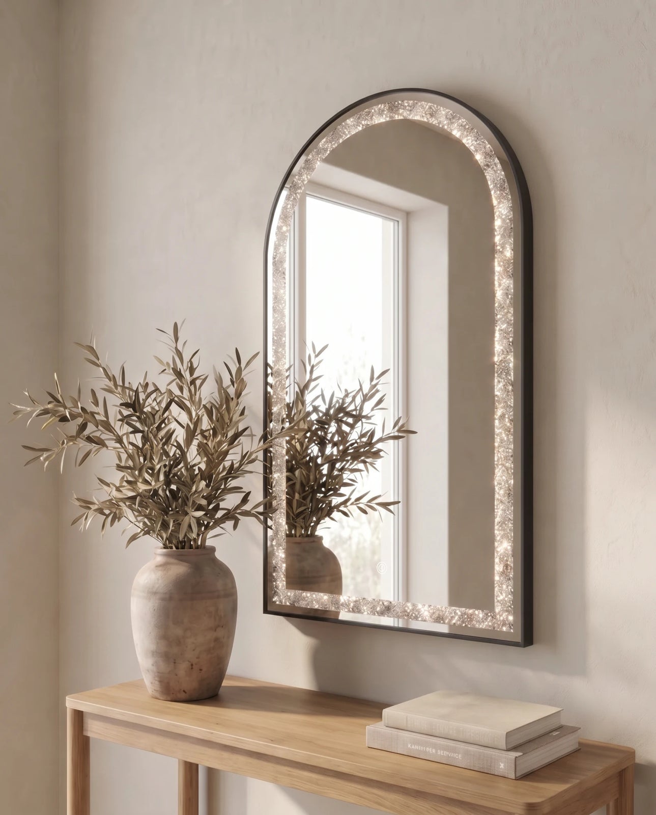 Celine black arch LED mirror with crystal inlay in a Dubai bathroom